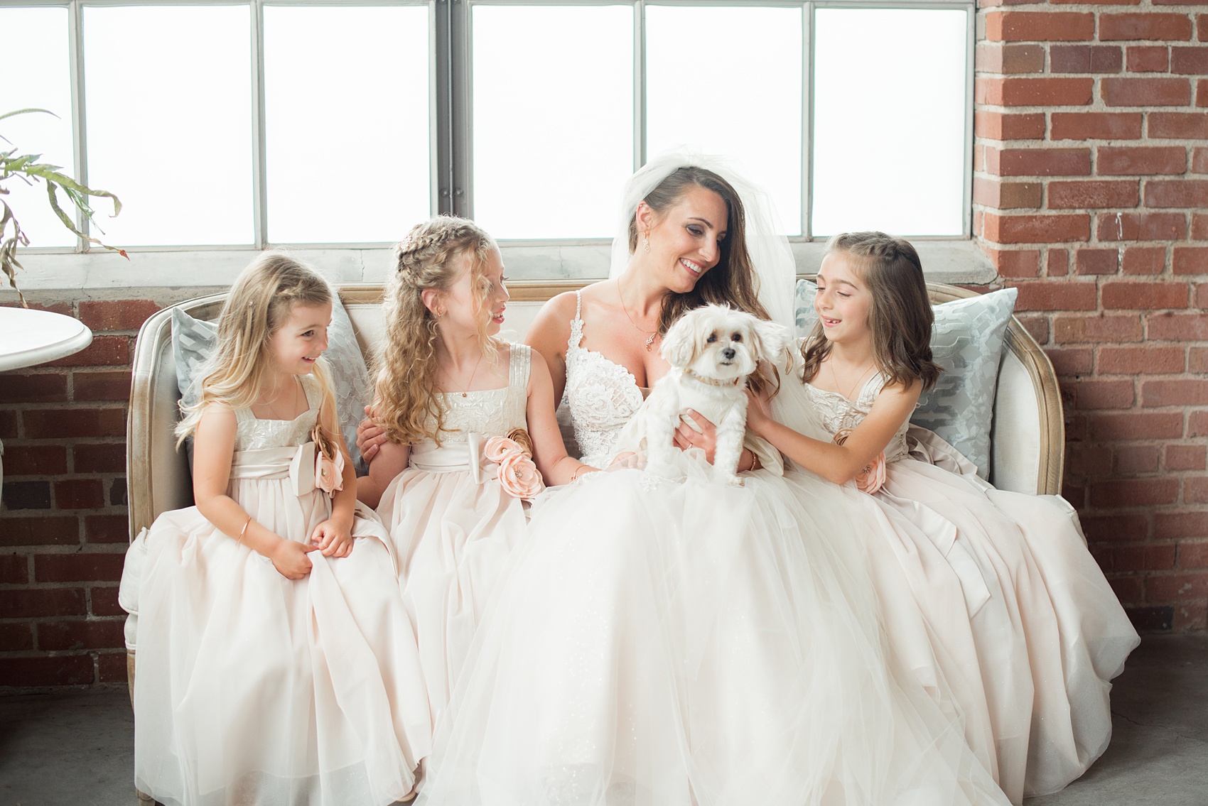 The Rickhouse wedding photos by Mikkel Paige photography in Durham, North Carolina. This urban venue has all the charm of the south for this bride and groom's spring wedding! The bride and groom's dog joining them for photos. Click to see more from their day! #mikkelpaige #northcarolina #southernwedding #TheRickhouseDurham #rosegoldandpink #weddingdog