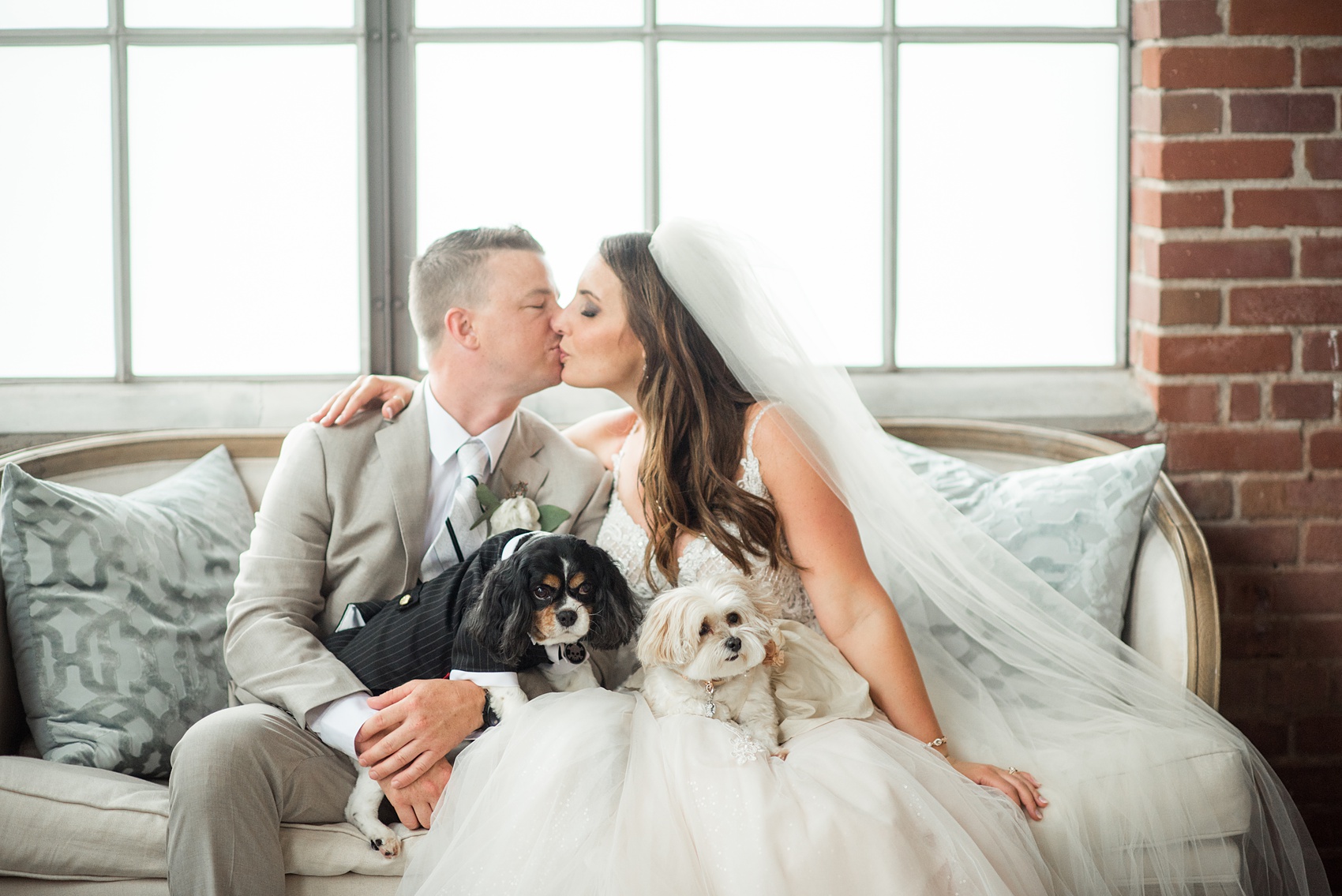 The Rickhouse wedding photos by Mikkel Paige photography in Durham, North Carolina. This urban venue has all the charm of the south for this bride and groom's spring wedding! The bride and groom's dog joining them for photos. Click to see more from their day! #mikkelpaige #northcarolina #southernwedding #TheRickhouseDurham #rosegoldandpink #weddingdog