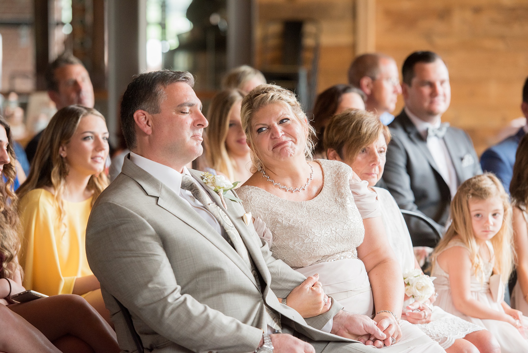 The Rickhouse wedding photos by Mikkel Paige photography in Durham, North Carolina. This urban venue has all the charm of the south for this bride and groom's spring wedding! The bride and groom had an indoor ceremony with white draping. Click to see more from their day! #mikkelpaige #northcarolina #southernwedding #TheRickhouseDurham #rosegoldandpink #weddingceremony #indoorceremony