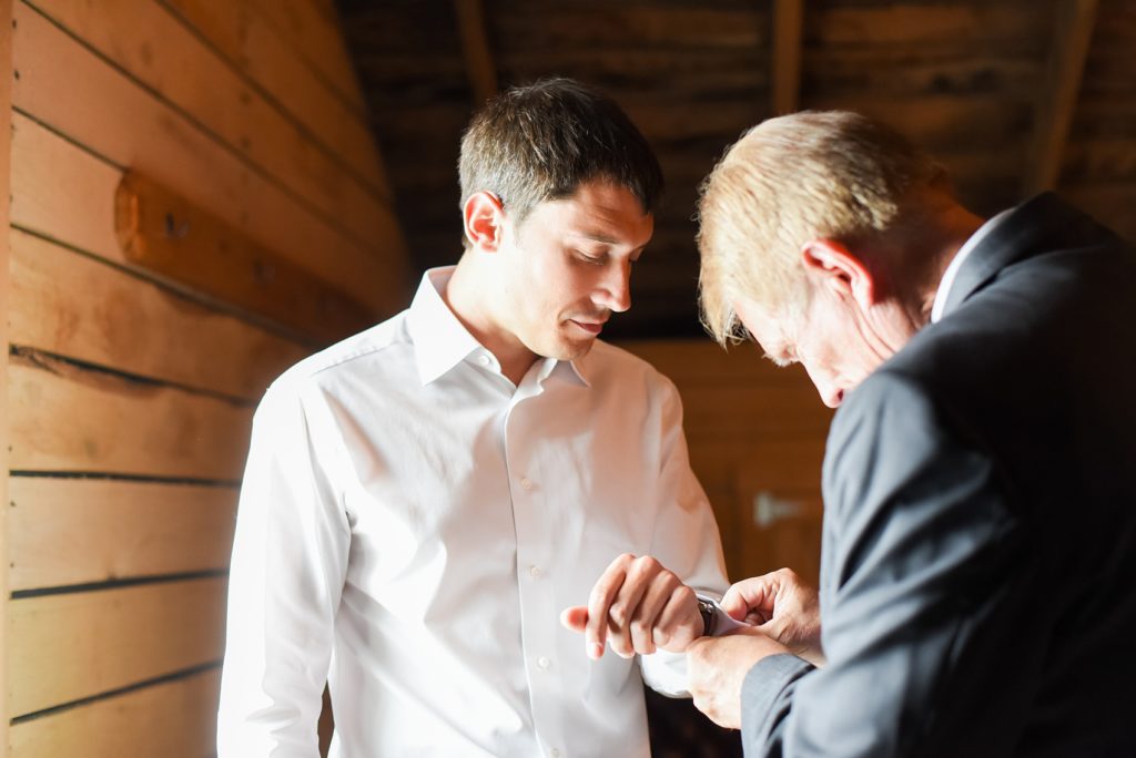 Charlottesville wedding photos by Mikkel Paige Photography. This Virginia venue is perfect for brides and grooms looking for a beautiful farm reception space. It’s green, romantic, and easy to dress up with flowers or keep simple! Click through for the complete post from this May event at the Lodge at Mount Ida Farm, including the groom’s getting ready photos! Planning by @vivalevent. #Charlottesville #mountidafarm #lodgeatmountida #CharlottesvilleVA #CharlottesvilleVirginia #Charlottesvillewedding #Charlottesvilleweddingphotographer #mikkelpaige #Vivalevent #cufflinks #groom #weddingheirloom