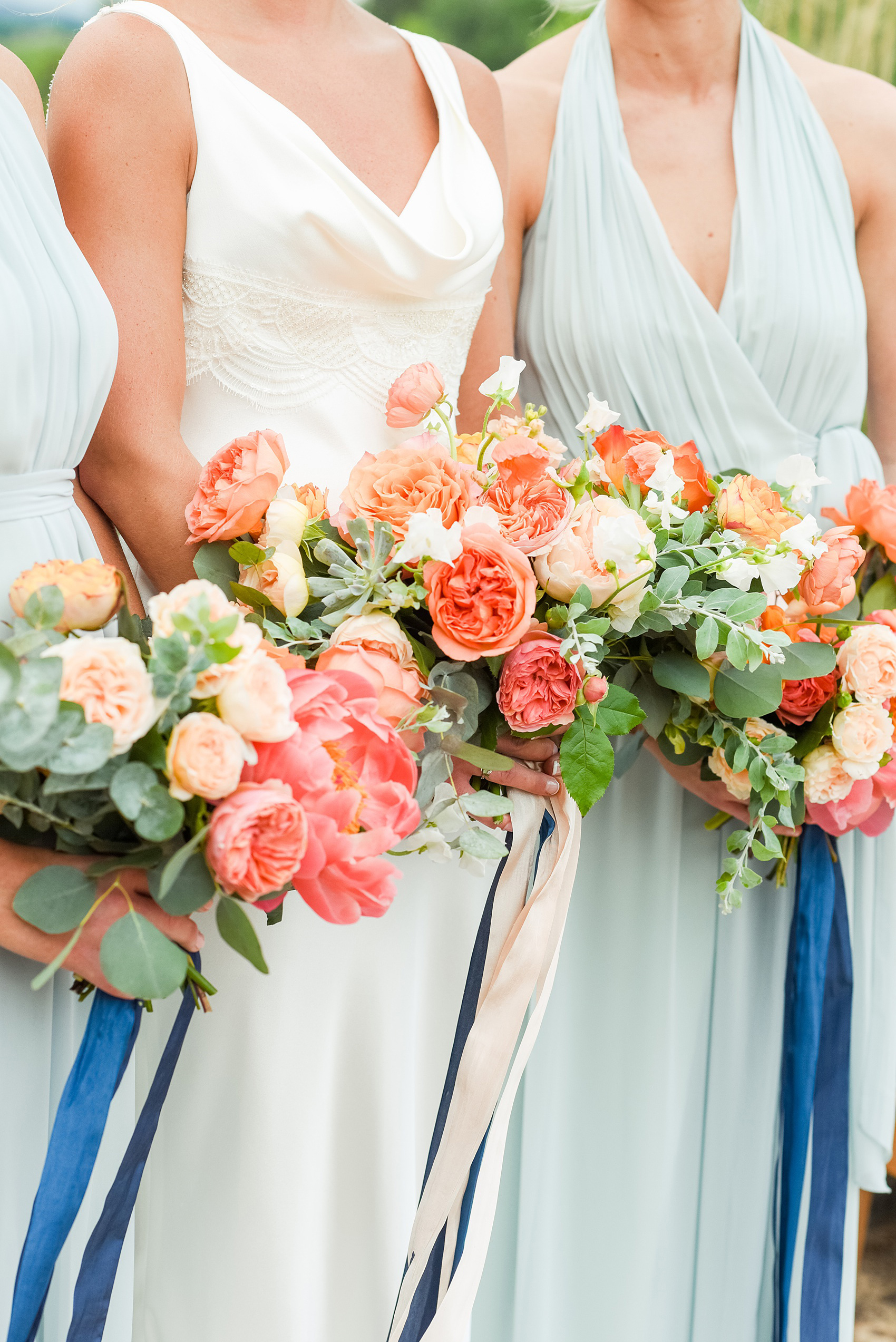 Charlottesville wedding photos by Mikkel Paige Photography. This Virginia venue is perfect for brides and grooms looking for a beautiful farm reception space. It’s green, romantic, and easy to dress up with flowers or keep simple. The bouquets were tied with long navy blue, peach and light pink ribbons and contained colorful flowers like garden roses, peonies, ranunculus and succulents. Click through for the complete post from this May event at the Lodge at Mount Ida Farm! Planning by @vivalevent and flowers by @apassarelli of Meristem Floral. #Charlottesville #mountidafarm #lodgeatmountida #CharlottesvilleVA #CharlottesvilleVirginia #Charlottesvillewedding #Charlottesvilleweddingphotographer #mikkelpaige #MeristemFloral #VivaLEvent