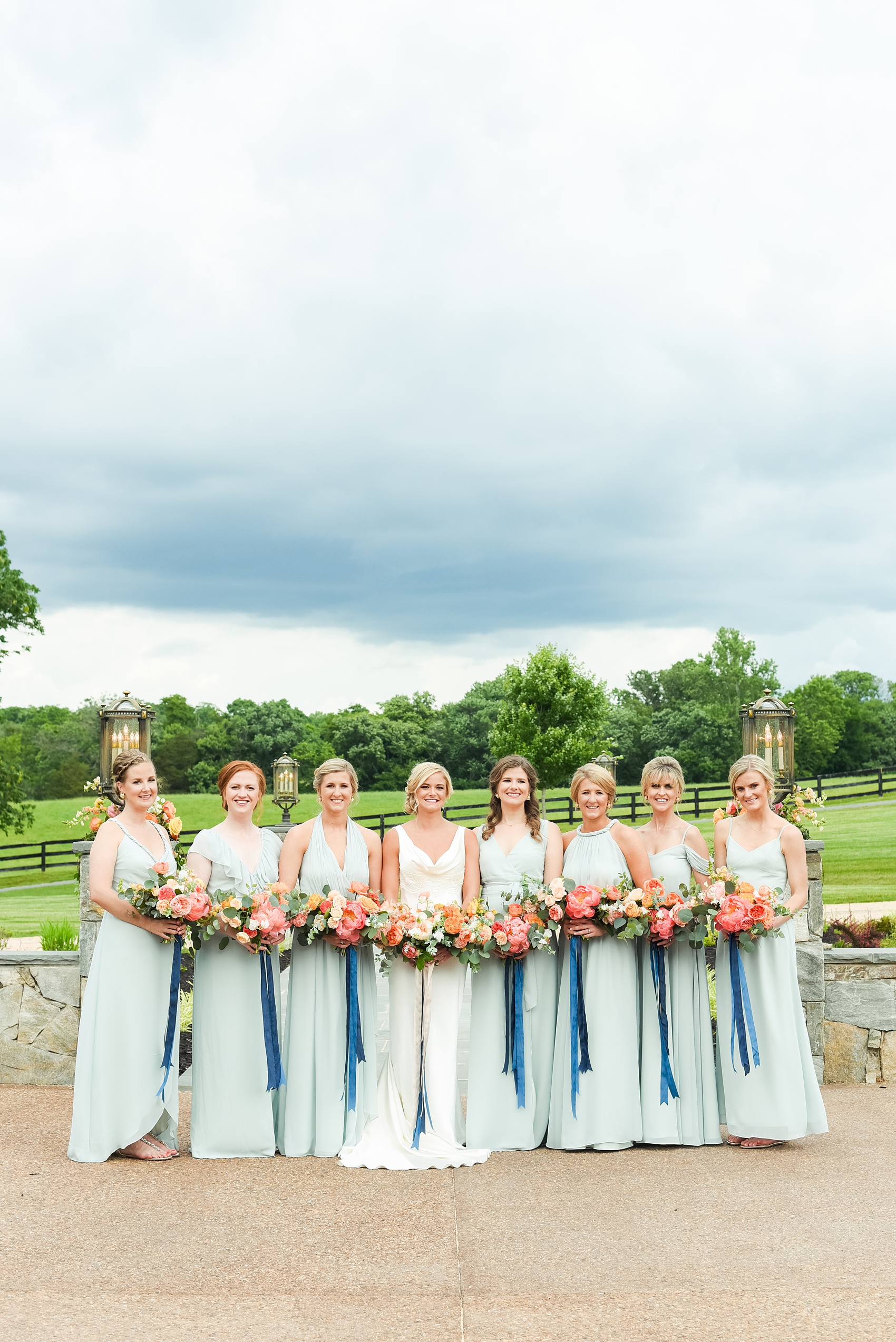 Charlottesville wedding photos by Mikkel Paige Photography. This Virginia venue is perfect for brides and grooms looking for a beautiful farm reception space. It’s green, romantic, and easy to dress up with flowers or keep simple. The bridesmaids wore mismatched mint green gowns and held colorful flowers. Click through for the complete post from this May event at the Lodge at Mount Ida Farm! Planning and design by @vivalevent and flowers by @apassarelli of Meristem Floral. #Charlottesville #mountidafarm #lodgeatmountida #CharlottesvilleVA #CharlottesvilleVirginia #Charlottesvillewedding #Charlottesvilleweddingphotographer #mikkelpaige #MeristemFloral #VivaLEvent