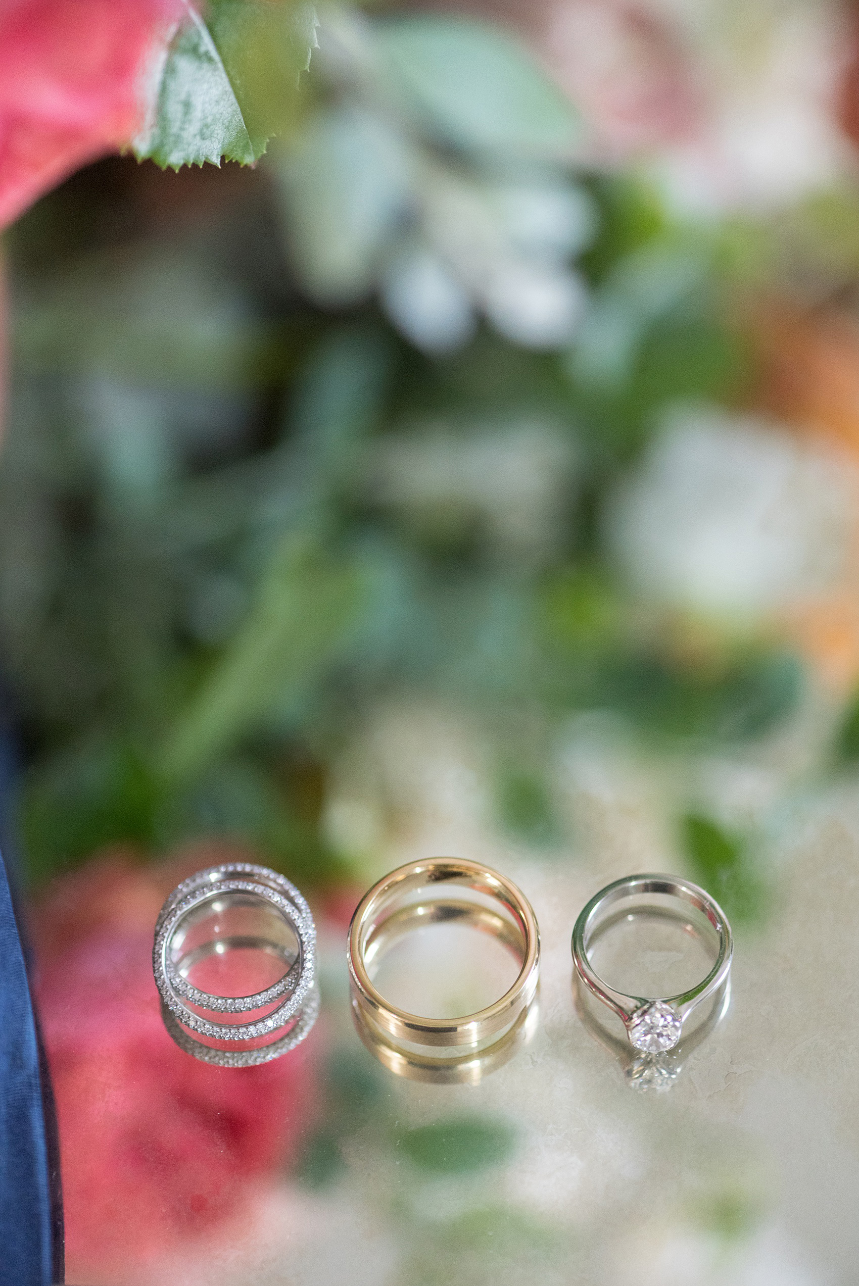 Charlottesville wedding photos by Mikkel Paige Photography. This Virginia venue is perfect for brides and grooms looking for a beautiful farm reception space. It’s green, romantic, and easy to dress up with flowers or keep simple! This detail picture shows the classic white and yellow gold wedding bands, eternity diamond rings and oval engagement ring. Click through for the complete post from this May event at the Lodge at Mount Ida Farm! Planning and design by Viva L’Event. #Charlottesville #mountidafarm #lodgeatmountida #CharlottesvilleVA #CharlottesvilleVirginia #Charlottesvillewedding #Charlottesvilleweddingphotographer #mikkelpaige #WeddingRings #ClassicWeddingsBands #Rings