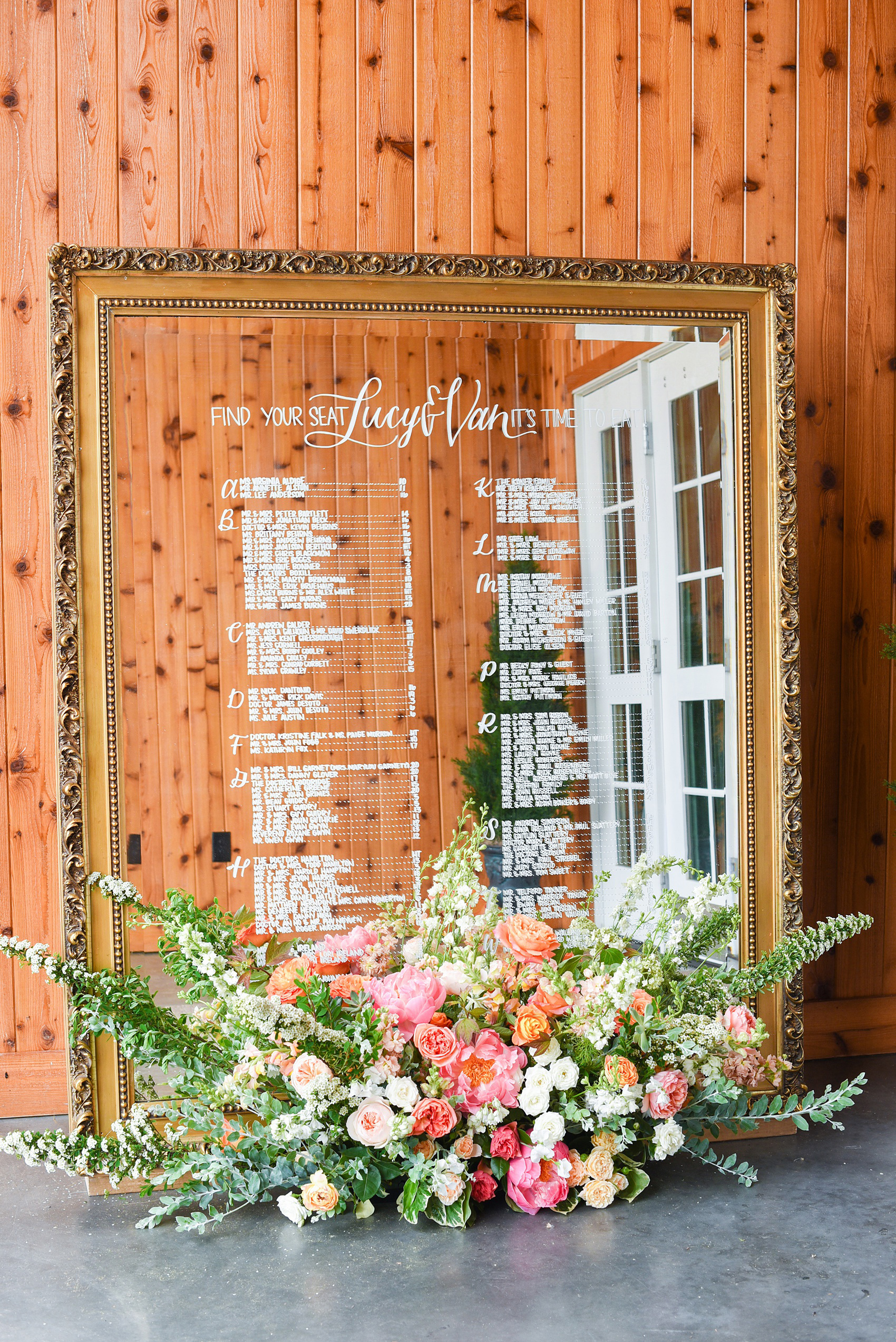 Charlottesville wedding photos at the Lodge at Mount Ida Farm by Mikkel Paige Photography. This Virginia venue is perfect for brides and grooms looking for a beautiful farm reception space. It’s green, romantic, and easy to dress up with flowers or keep simple. Custom mirror seating chart was decorated with flowers by Meristem Floral and written by Mason Dixon Designs. Click through for the complete post from this May event! #Charlottesville #mountidafarm #lodgeatmountida #CharlottesvilleVA #CharlottesvilleVirginia #Charlottesvillewedding #Charlottesvilleweddingphotographer #mikkelpaige #MeristemFloral #VivaLEvent #mirrorsign #seatingchart #seatingsign #masondixondesigns #calligraphy