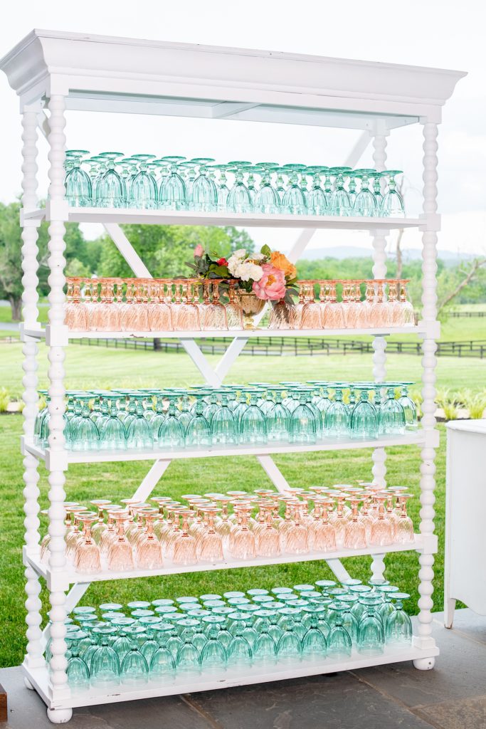 Charlottesville wedding photos at the Lodge at Mount Ida Farm by Mikkel Paige Photography. This Virginia venue is perfect for brides and grooms looking for a beautiful farm reception space. It’s green, romantic, and easy to dress up with flowers or keep simple. There was a self-serve non-alcoholic drinks area with blue and pink glass cups from Cottage Luxe available for guests. Click through for the complete post and detail pictures from this May event! #Charlottesville #mountidafarm #lodgeatmountida #CharlottesvilleVA #CharlottesvilleVirginia #Charlottesvillewedding #Charlottesvilleweddingphotographer #mikkelpaige #CottageLuxe #VivaLEvent