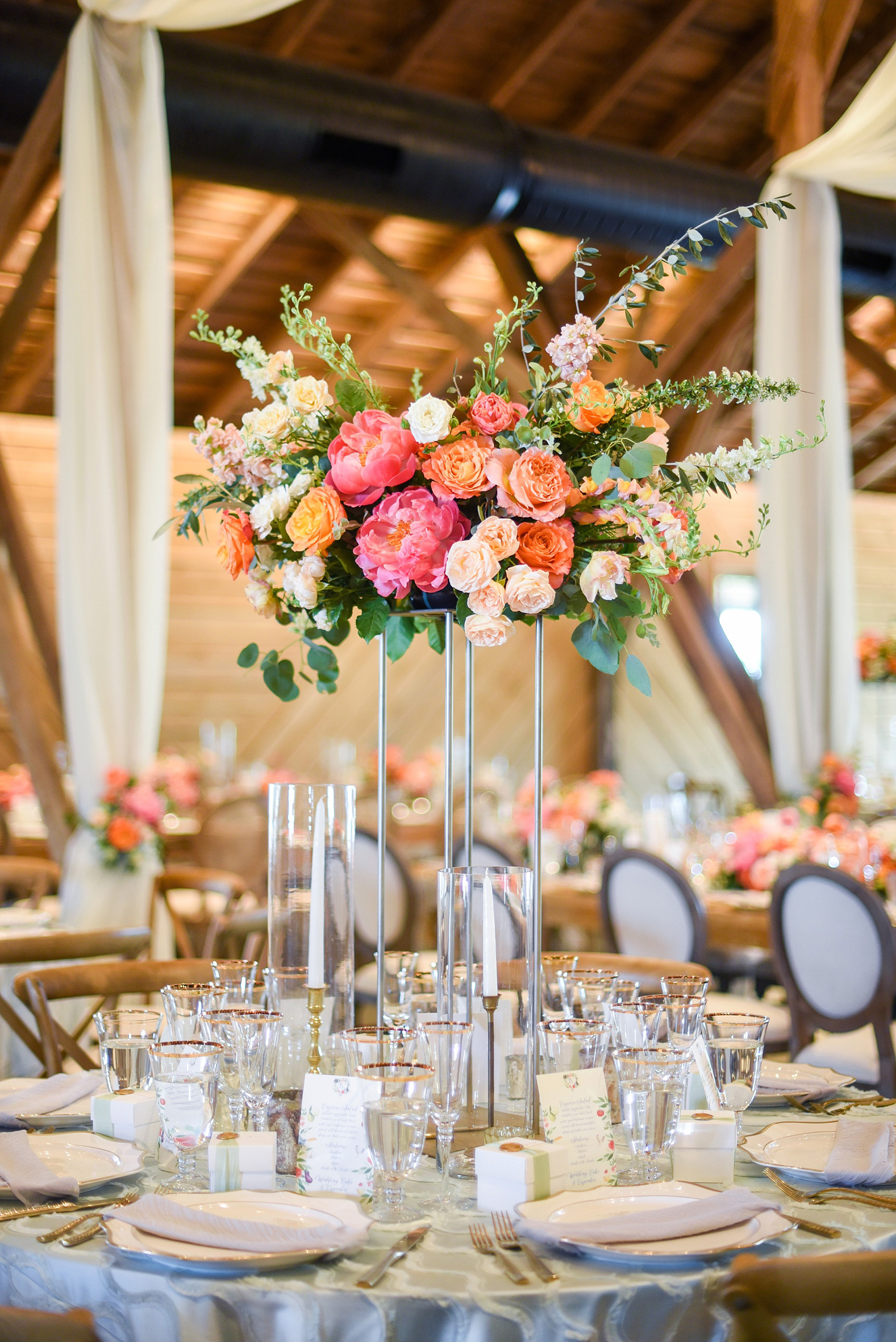 Charlottesville wedding photos by Mikkel Paige Photography. This Virginia venue is perfect for brides and grooms looking for a beautiful farm reception space. It’s green, romantic, and easy to dress up with flowers or keep simple. The tall and short centerpieces contained colorful flowers like garden roses, peonies, ranunculus and succulents. Click through for the complete post from this May event at the Lodge at Mount Ida Farm! Planning and design by @vivalevent and flowers by @apassarelli of Meristem Floral. #Charlottesville #mountidafarm #lodgeatmountida #CharlottesvilleVA #CharlottesvilleVirginia #Charlottesvillewedding #Charlottesvilleweddingphotographer #mikkelpaige #MeristemFloral #VivaLEvent