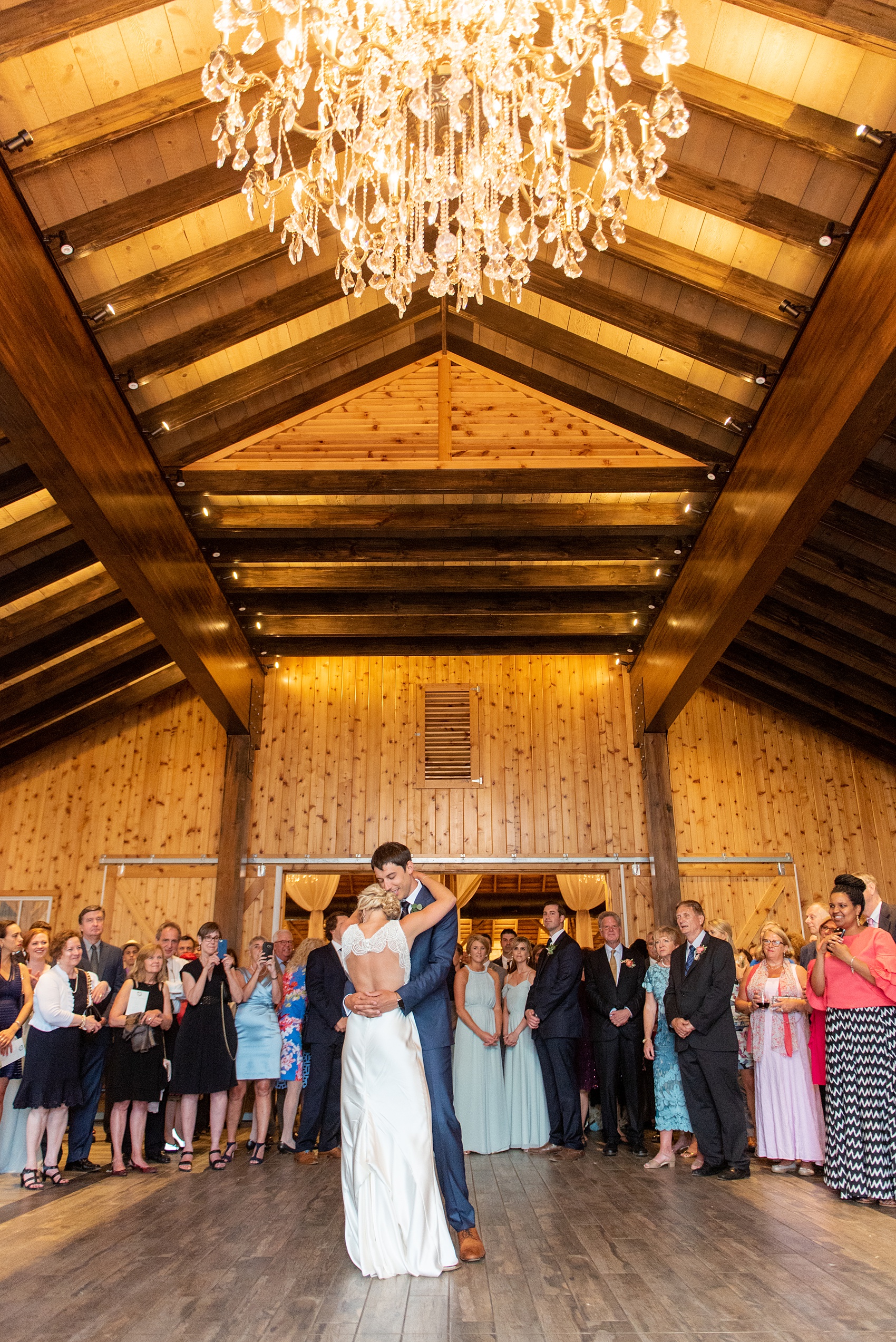 Charlottesville wedding photos by Mikkel Paige Photography. This Virginia venue is perfect for brides and grooms looking for a beautiful farm reception space. It’s green, romantic, and easy to dress up with flowers or keep simple. The couple danced to the sounds of a live band, Kristen and the Noise, for their spring barn reception. Click through for the complete post from this May event at the Lodge at Mount Ida Farm! Planning and design by Viva L’Event. #Charlottesville #mountidafarm #lodgeatmountida #CharlottesvilleVA #CharlottesvilleVirginia #Charlottesvillewedding #Charlottesvilleweddingphotographer #mikkelpaige #KristenandtheNoise