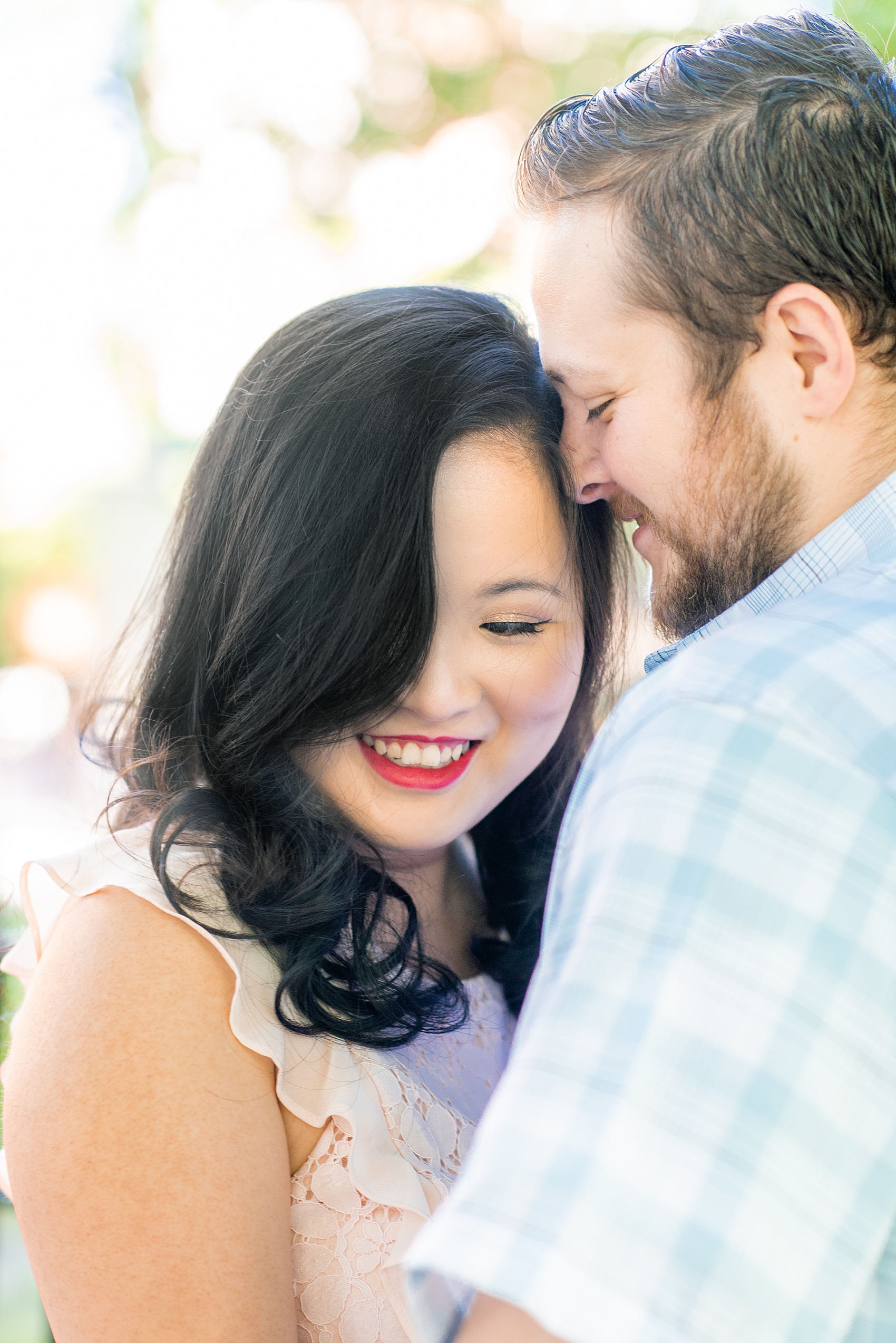 Lower East Side engagement photos and colorful ideas for a shoot in Manhattan by Mikkel Paige Photography. These creative pictures with an interracial couple (and the bride's amazing makeup!) in an urban environment in downtown NYC will have you wanting to see more...be sure to click through to see the entire shoot! #mikkelpaige #EngagementPhotos #engagementshoot #EngagementPictures 