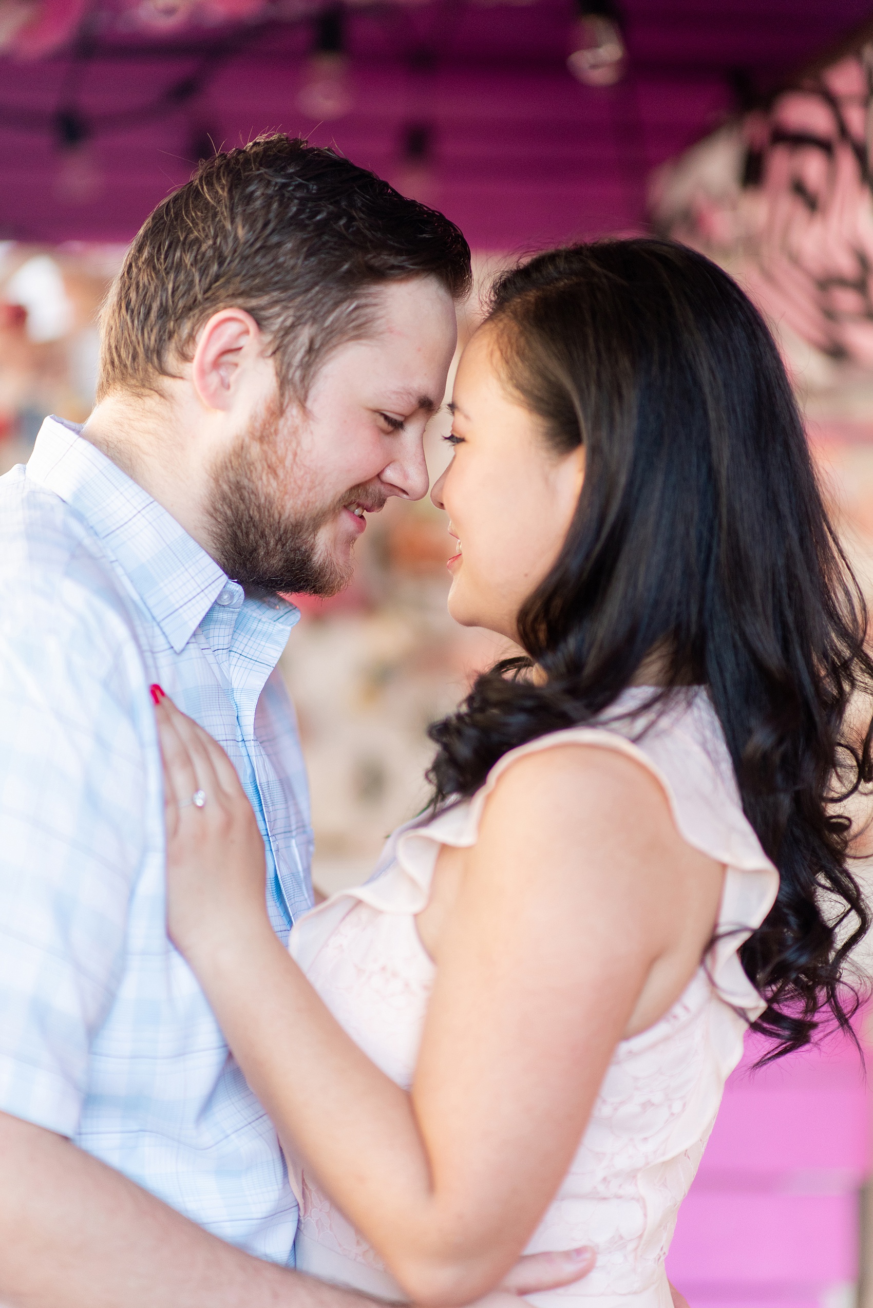 Lower East Side engagement photos and colorful ideas for a shoot in Manhattan by Mikkel Paige Photography. These creative pictures with an interracial couple in an urban environment in downtown NYC will have you wanting to see more...be sure to click through to see the entire shoot! #mikkelpaige #EngagementPhotos #engagementshoot #EngagementPictures 