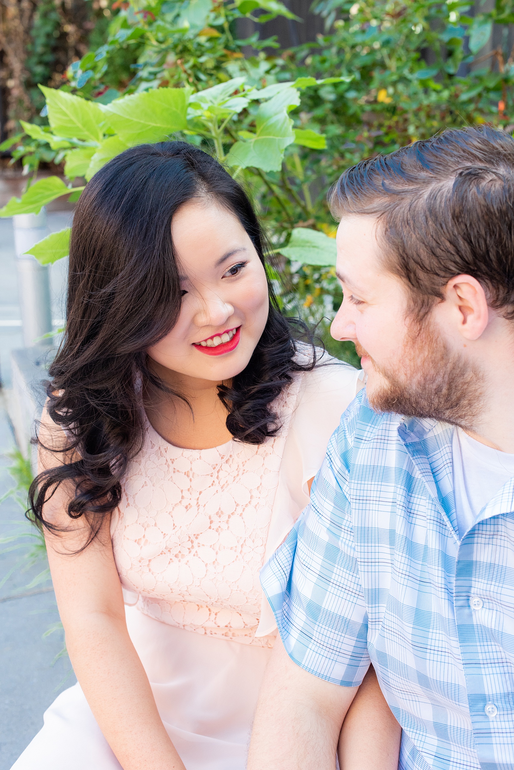 Lower East Side engagement photos and colorful ideas for a shoot in Manhattan by Mikkel Paige Photography. These creative pictures with an interracial couple (and the bride's amazing makeup!) in an urban environment in downtown NYC will have you wanting to see more...be sure to click through to see the entire shoot! #mikkelpaige #EngagementPhotos #engagementshoot #EngagementPictures