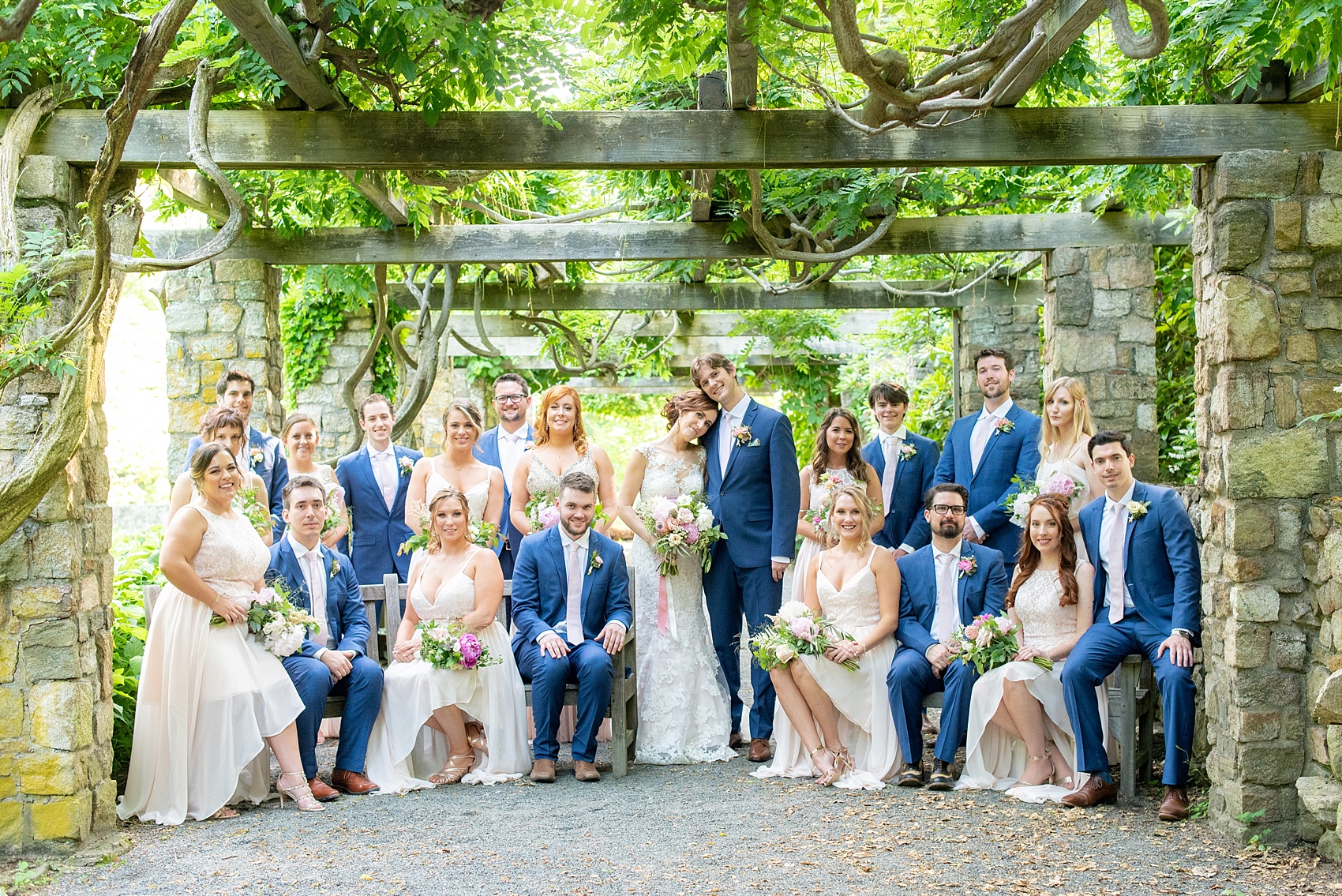 Olde Mill Inn wedding photos by Mikkel Paige Photography in New Jersey. This venue is great for a wedding in any season, from summer, to fall, spring and winter. The bride and groom chose to do their bridal party photos in the nearby Cross Estate Gardens. Click through for more! #mikkelpaige #newjerseyweddingphotos #newjerseyweddingphotographer