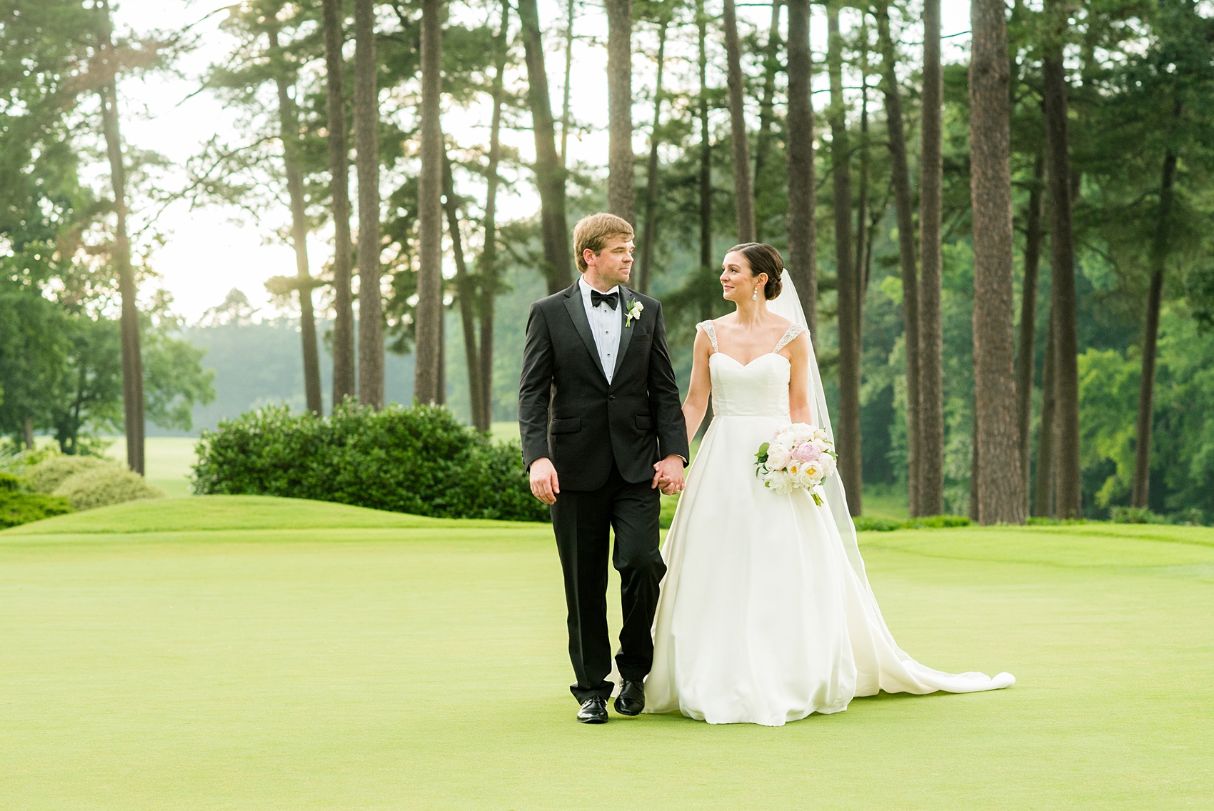 Mikkel Paige Photography pictures of a venue in Durham, North Carolina. The Washington Duke Inn is perfect for a summer wedding! Planning for this beautiful event was by McLean Events. Click through for more details about this blue and grey wedding with peonies! #MikkelPaige #DurhamWeddings #WashingtonDukeInn #DukeWedding #Duke #McLeanEvents