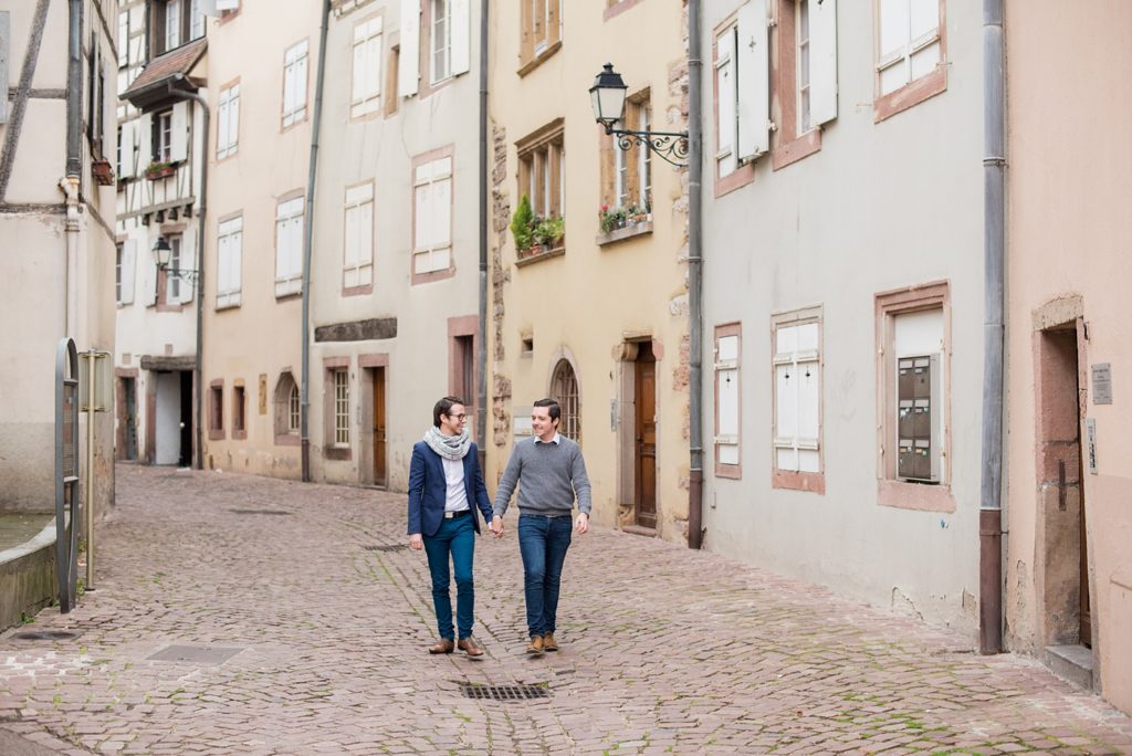 Engagement couples session with a gay male couple in Colmar, France. Photos by Mikkel Paige Photography in this fairy tale village in the Alsace region of the European country.