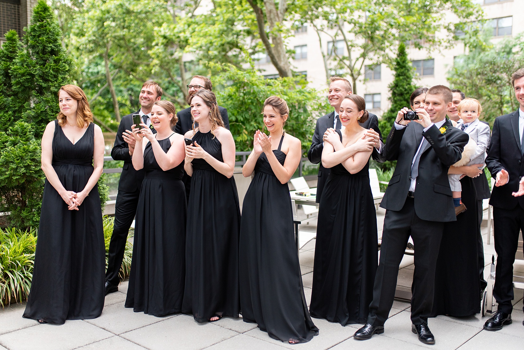 Manhattan Central Park wedding photos by Mikkel Paige Photography at Loeb Boathouse venue. These summer ceremony and reception pictures show a timeless couple having fun at their colorful day with guests who traveled in from abroad. The bride and groom did their first look on the Upper West Side...click through for the complete post! #CentralParkWeddingVenues #NYCweddingphotographer #NYCwedding