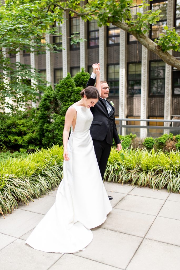 Manhattan Central Park wedding photos by Mikkel Paige Photography at Loeb Boathouse venue. These summer ceremony and reception pictures show a timeless couple having fun at their colorful day with guests who traveled in from abroad. The bride and groom did their emotional first look on the Upper West Side...click through for the complete post! #CentralParkWeddingVenues #NYCweddingphotographer #NYCwedding #firstlook