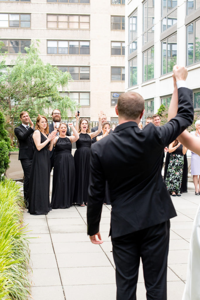 Manhattan Central Park wedding photos by Mikkel Paige Photography at Loeb Boathouse venue. These summer ceremony and reception pictures show a timeless couple having fun at their colorful day with guests who traveled in from abroad. The bride and groom did their emotional first look on the Upper West Side...click through for the complete post! #CentralParkWeddingVenues #NYCweddingphotographer #NYCwedding #firstlook