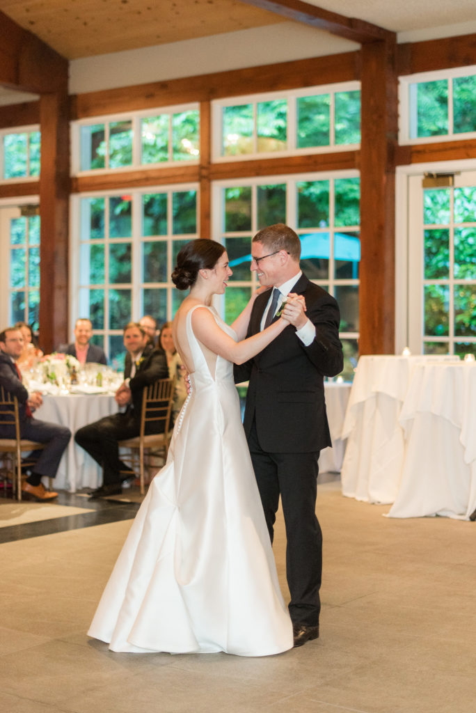 Manhattan Central Park wedding photos by Mikkel Paige Photography at Loeb Boathouse venue. The reception was by the lake and Bethesda Terrace for a June celebration. Guests, who traveled in from near and far, danced the night away inside the venue, with the bride and groom doing their first dance to Frank Sinatra's "Fly Me to the Moon". Click through for the complete post! #CentralParkWeddingVenues #NYCwedding #SummerWedding #brideandgroom #firstdance #firstdancesong