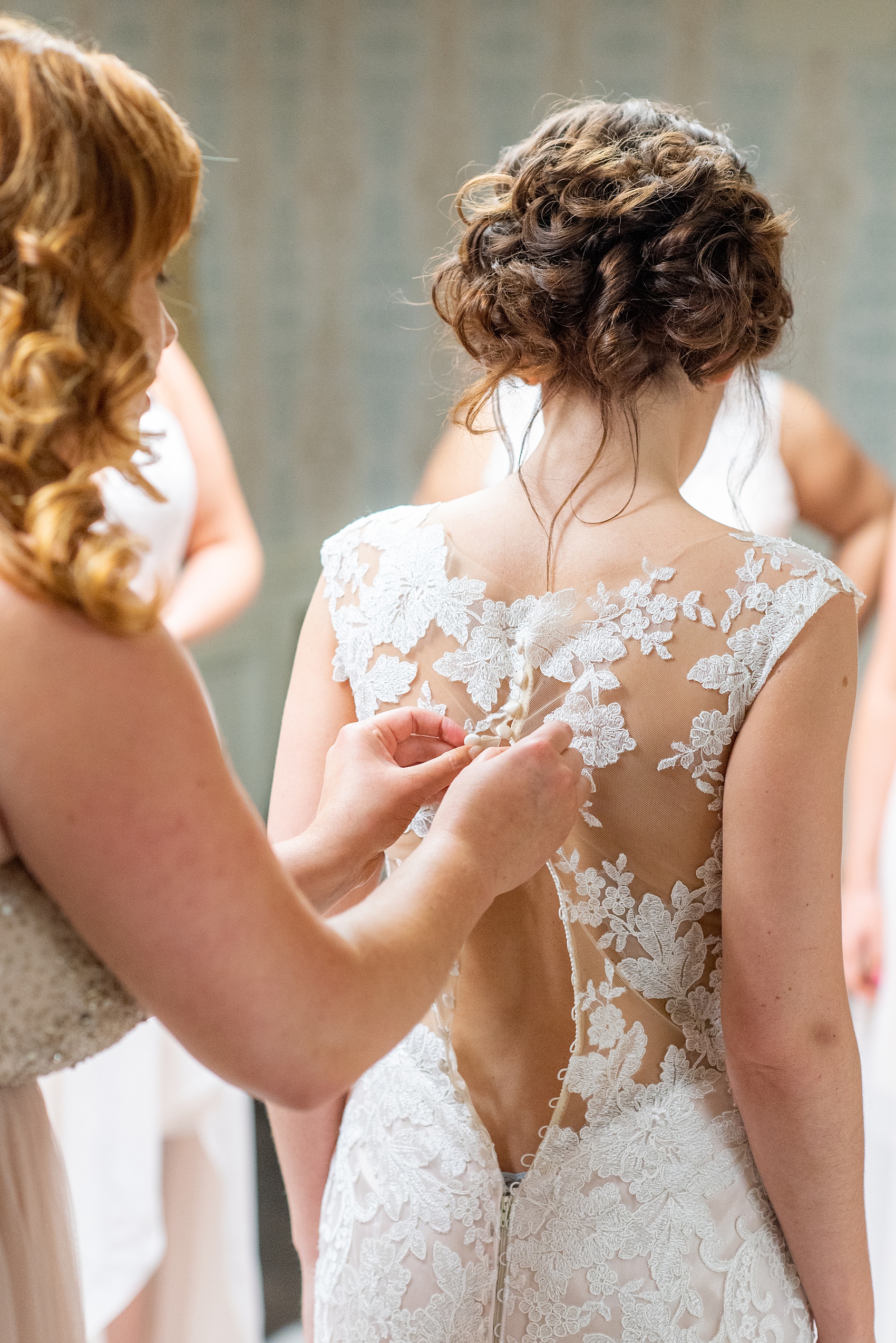 A summer wedding at Olde Mill Inn, NJ. Photos by Mikkel Paige Photography for an event with light pink and blue details. The bride got ready at the New Jersey venue with her bridesmaids. She wore blush gemstone earrings and her wedding gown had a blush underlay to give it the perfect tint of color. Click through for their complete wedding recap! #OldeMillInn #NJwedding #NJweddingphotographer #mikkelpaige #NewJerseyWeddingVenue #NewJerseyWedding #CrossEstateGardens #bridalportraits #bride #herecomesthebride #AllureBridal #laceweddinggown #gettingready #gettingready