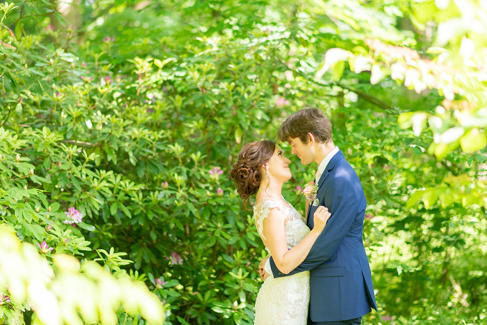 A summer wedding at Olde Mill Inn, NJ. Photos by Mikkel Paige Photography for an event with pink and blue details. The bride and groom chose to have their photos taken at Cross Estate Gardens, just down the road from this New Jersey Venue. Click through for their complete wedding recap! #OldeMillInn #NJwedding #NJweddingphotographer #mikkelpaige #NewJerseyWeddingVenue #NewJerseyWedding #CrossEstateGardens #brideandgroom 