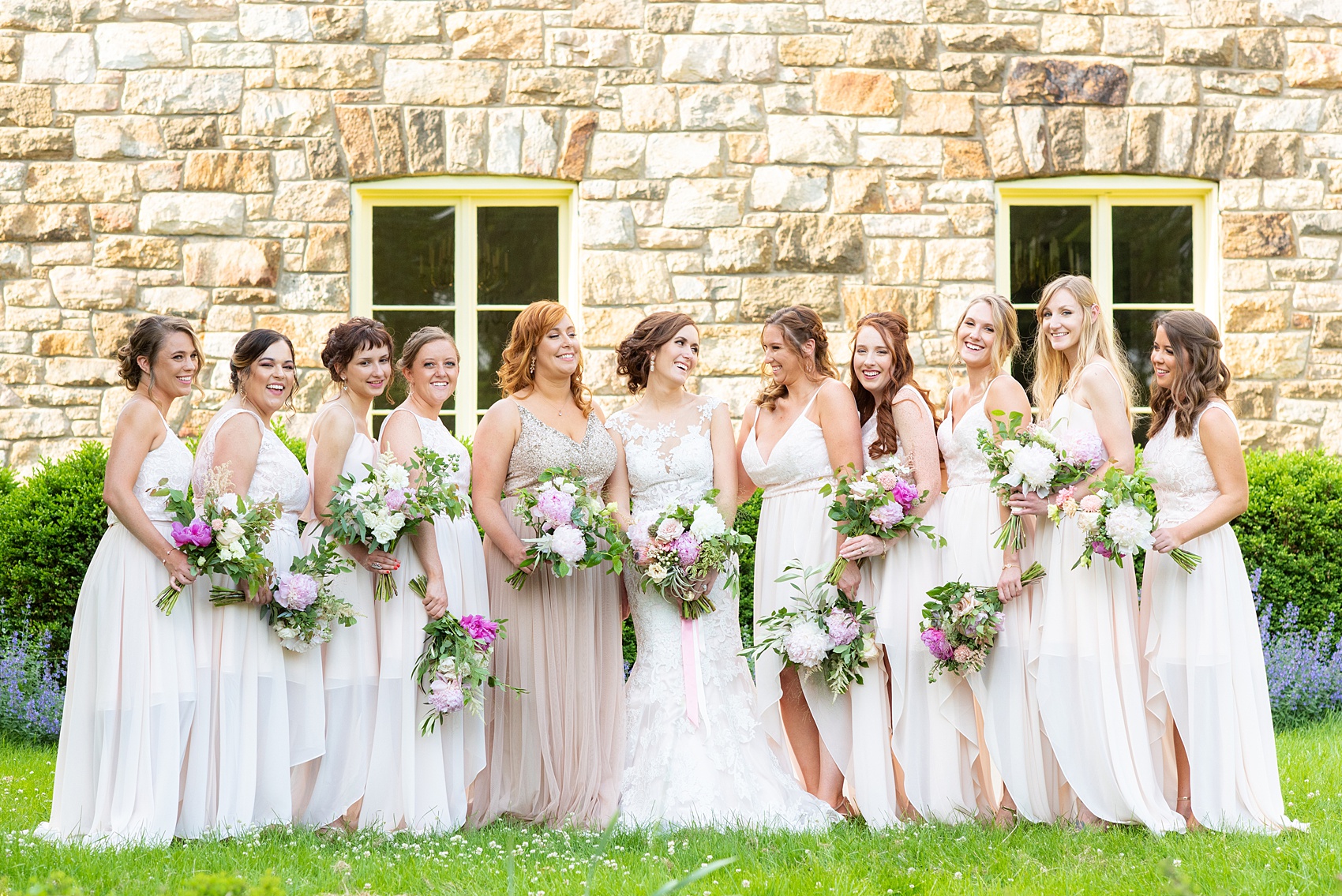 A summer wedding at Olde Mill Inn, NJ. Photos by Mikkel Paige Photography. This New Jersey venue is a great option for an event not too far from NYC. The wedding party photos were at nearby Cross Estate Gardens, a beautiful lush area for bridal party photos. The bridesmaids wore light pink, mis-matched gowns. Click through for their complete wedding recap! #OldeMillInn #NJwedding #NJweddingphotographer #mikkelpaige #NewJerseyWeddingVenue #NewJerseyWedding #CrossEstateGardens #weddingdetails #bridalparty #pinkbridesmaids #mismatcheddresses #mismatchedbridesmaids #peonybouquets