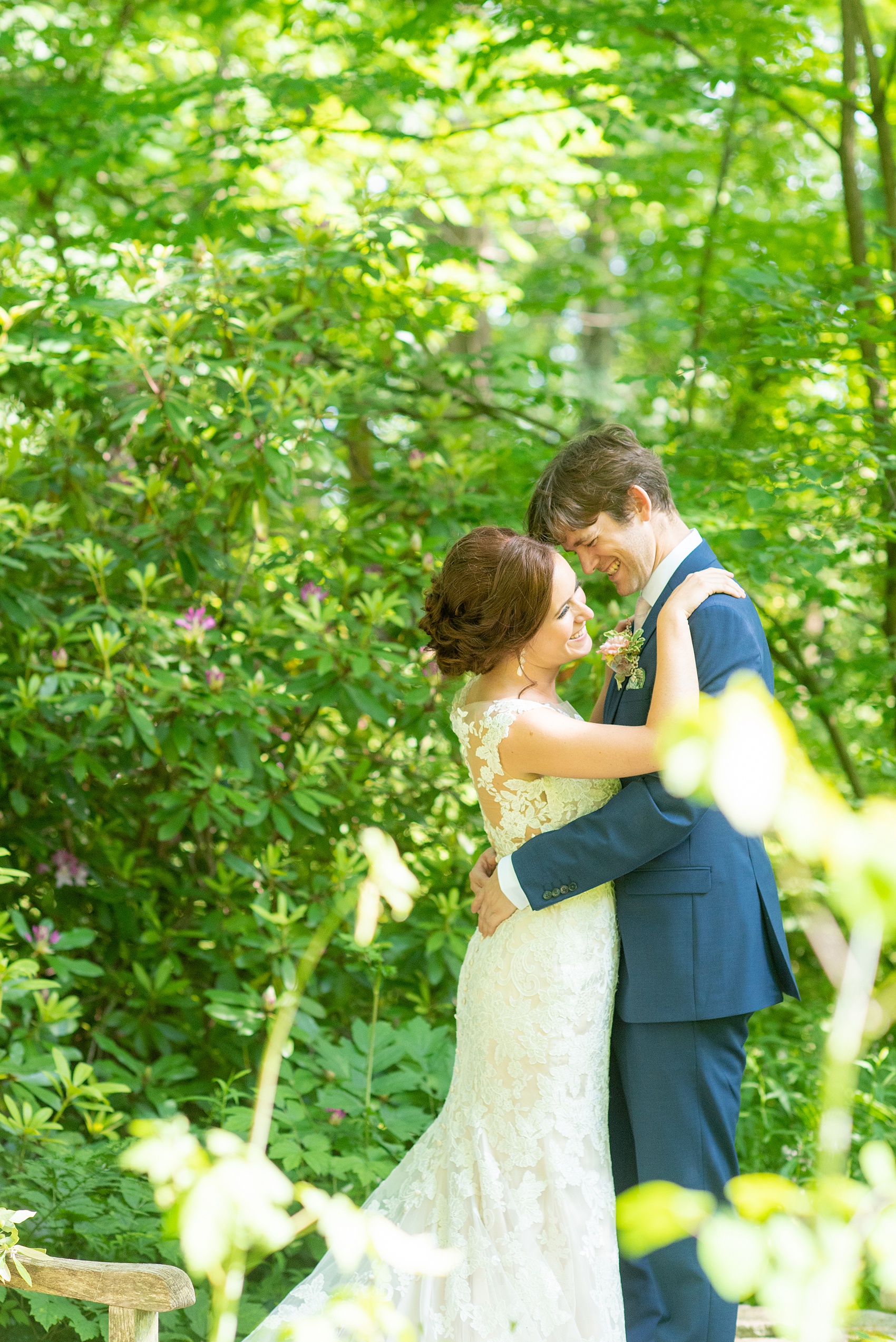 A summer wedding at Olde Mill Inn, NJ. Photos by Mikkel Paige Photography for an event with pink and blue details. The bride and groom chose to have their photos taken at Cross Estate Gardens, just down the road from this New Jersey Venue. Click through for their complete wedding recap! #OldeMillInn #NJwedding #NJweddingphotographer #mikkelpaige #NewJerseyWeddingVenue #NewJerseyWedding #CrossEstateGardens #brideandgroom