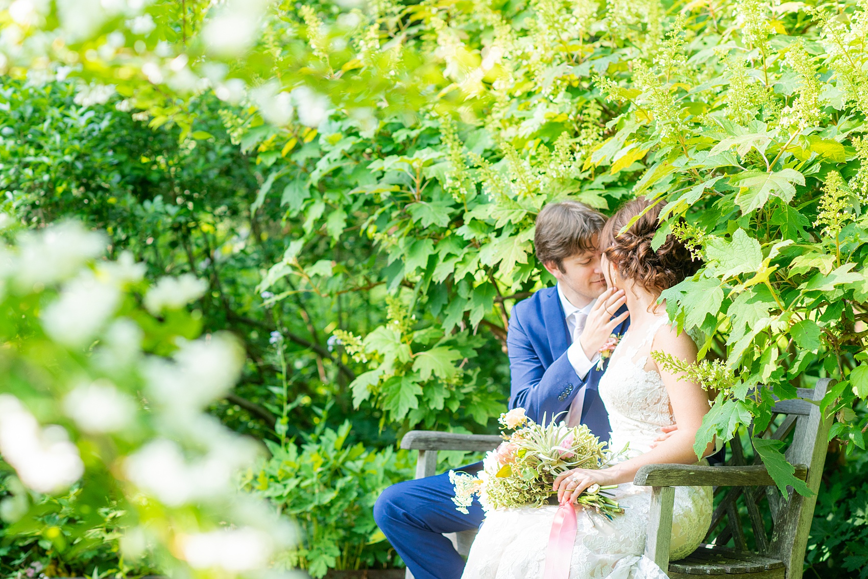 A summer wedding at Olde Mill Inn, NJ. Photos by Mikkel Paige Photography for an event with pink and blue details. The bride and groom chose to have their photos taken at Cross Estate Gardens, just down the road from this New Jersey Venue. Click through for their complete wedding recap! #OldeMillInn #NJwedding #NJweddingphotographer #mikkelpaige #NewJerseyWeddingVenue #NewJerseyWedding #CrossEstateGardens #brideandgroom 