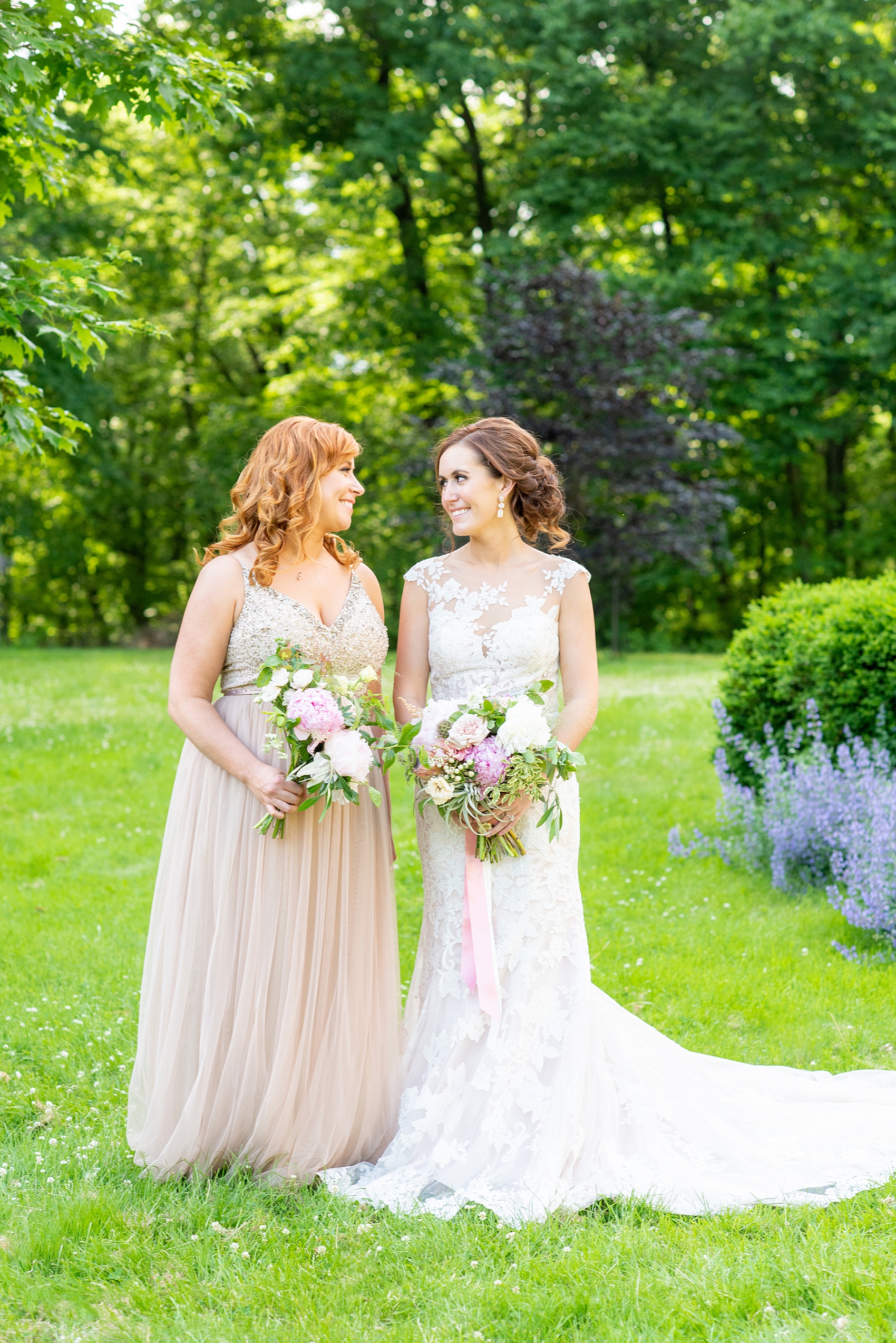 A summer wedding at Olde Mill Inn, NJ. Photos by Mikkel Paige Photography. This New Jersey venue is a great option for an event not too far from NYC. The wedding party photos were at nearby Cross Estate Gardens, a beautiful lush area for bridal party photos. The bridesmaids wore light pink, mis-matched gowns. Click through for their complete wedding recap! #OldeMillInn #NJwedding #NJweddingphotographer #mikkelpaige #NewJerseyWeddingVenue #NewJerseyWedding #CrossEstateGardens #weddingdetails #bridalparty #pinkbridesmaids #mismatcheddresses #mismatchedbridesmaids