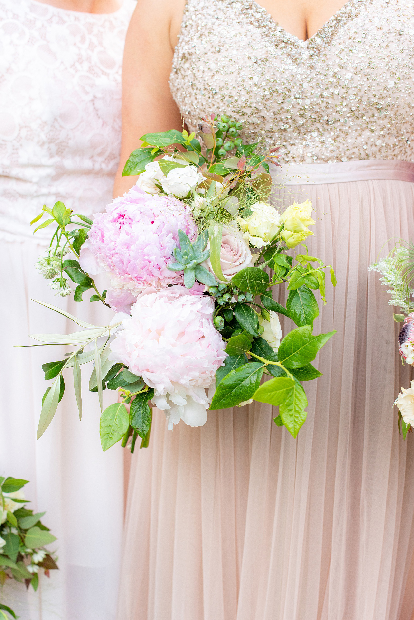 A summer wedding at Olde Mill Inn, NJ. Photos by Mikkel Paige Photography. This New Jersey venue is a great option for an event not too far from NYC. The wedding party photos were at nearby Cross Estate Gardens, a beautiful lush area for bridal party and groomsmen photos. The bridesmaids wore light pink, mis-matched gowns and carried peony bouquets with greenery to compliment the bride’s flowers. Click through for their complete wedding recap! #OldeMillInn #NJwedding #NJweddingphotographer #mikkelpaige #NewJerseyWeddingVenue #NewJerseyWedding #CrossEstateGardens #weddingdetails #bridalparty #pinkbridesmaids #bridesmaidsbouquets #peonies