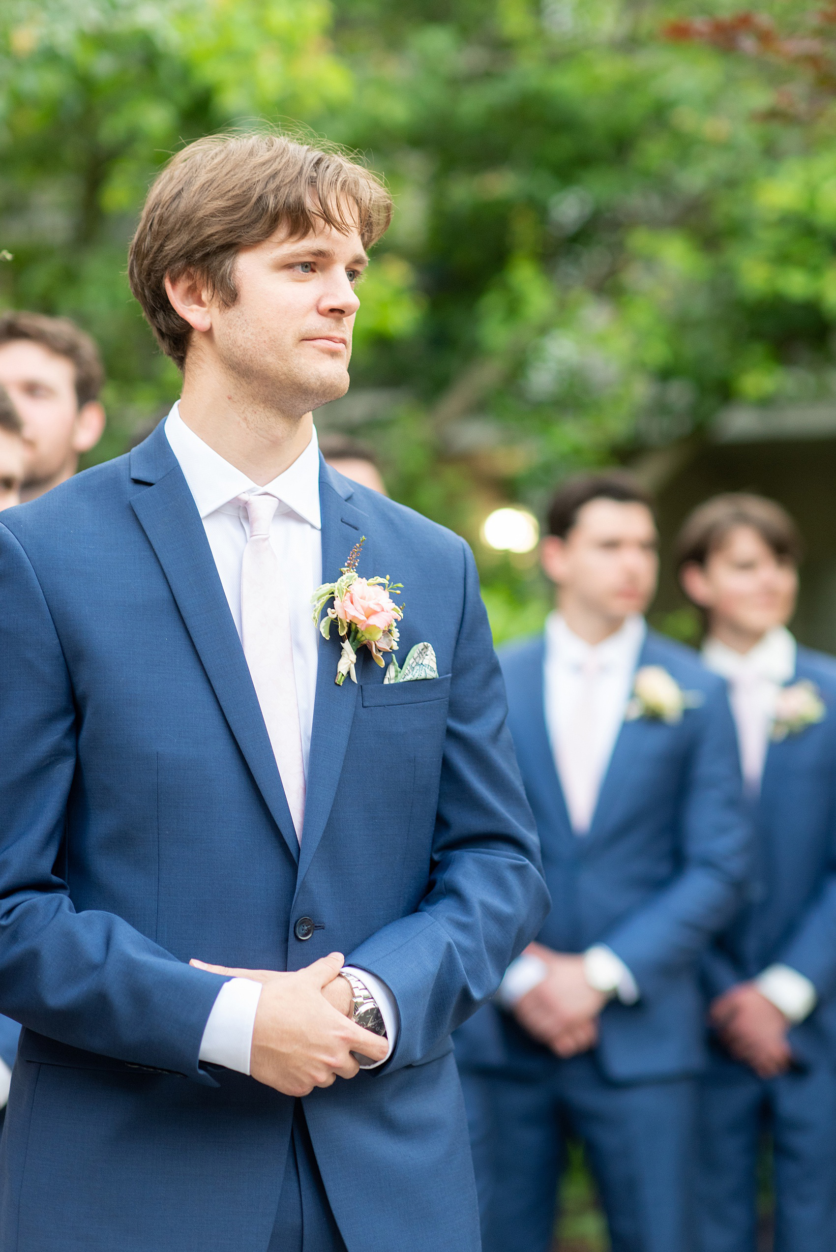 A summer wedding at Olde Mill Inn, NJ. Photos by Mikkel Paige Photography for an event with light pink and blue details. This New Jersey venue is a great option for something not too far from NYC. The couple had their ceremony in the interior courtyard and the groom awaited his bride coming down the aisle! Click through for their complete wedding recap! #OldeMillInn #NJwedding #NJweddingphotographer #mikkelpaige #NewJerseyWeddingVenue #NewJerseyWedding #CrossEstateGardens 