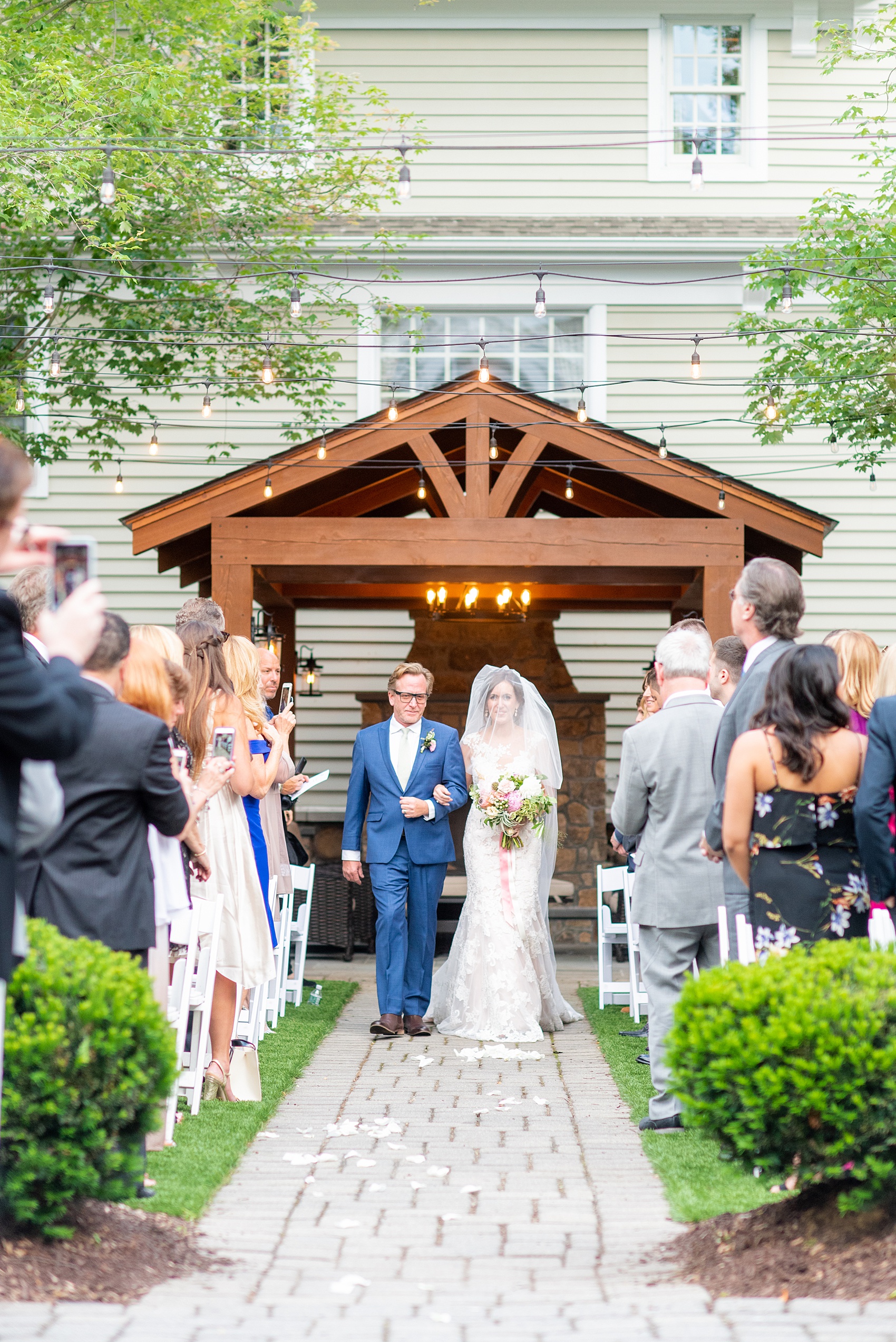 A summer wedding at Olde Mill Inn, NJ. Photos by Mikkel Paige Photography for an event with light pink and blue details. This New Jersey venue is a great option for something not too far from NYC. The couple had their ceremony in the interior courtyard. Click through for their complete wedding recap! #OldeMillInn #NJwedding #NJweddingphotographer #mikkelpaige #NewJerseyWeddingVenue #NewJerseyWedding #CrossEstateGardens 
