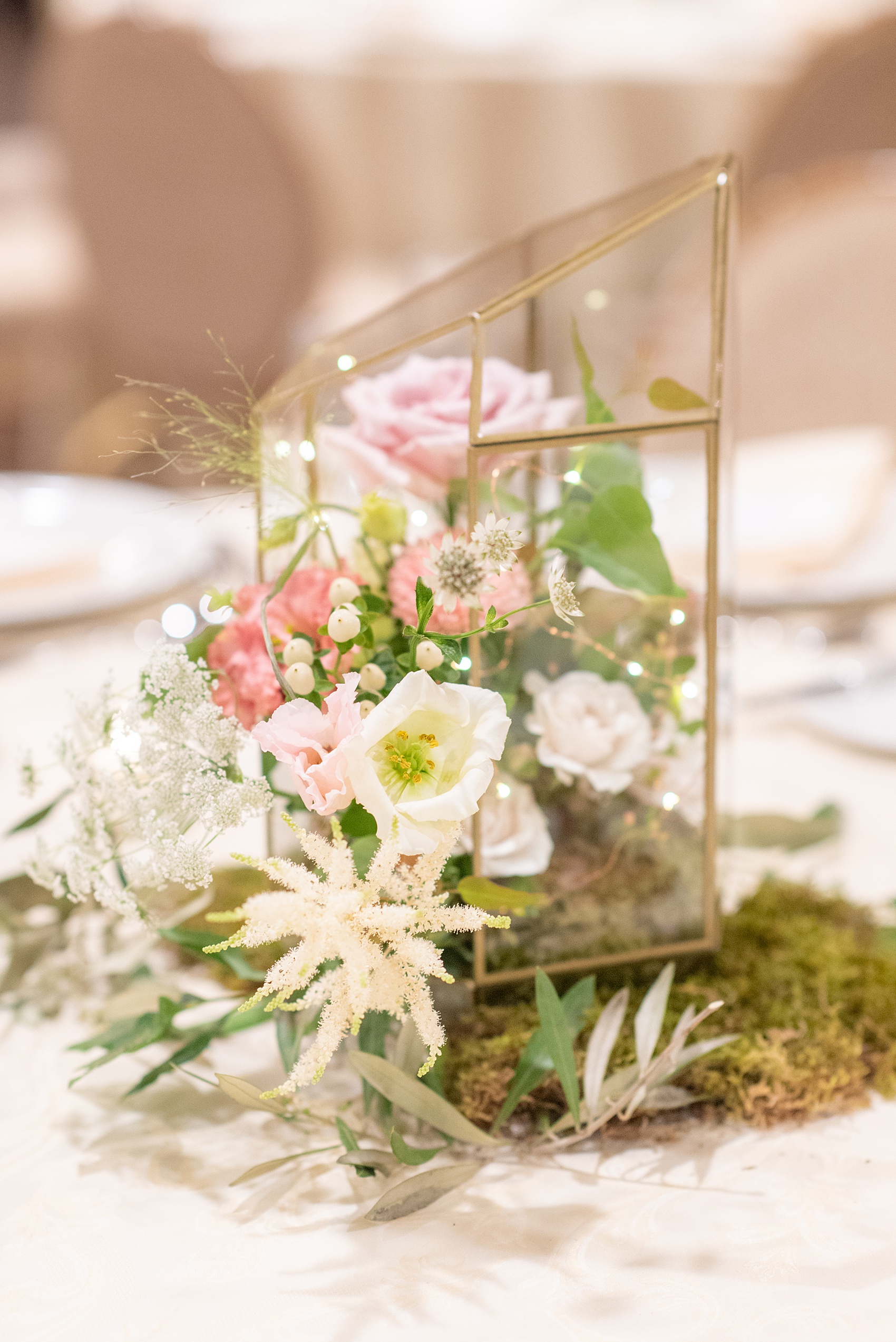 A June wedding at Olde Mill Inn, NJ. Photos by Mikkel Paige Photography for an event with pink details. This New Jersey venue is a great option for something not too far from NYC. The reception was filled with unique glass terrarium vases, colorful pink flowers and greenery, peonies and Midsummer Night’s Dream theme details. Click through for their complete wedding recap! #OldeMillInn #NJwedding #NJweddingphotographer #mikkelpaige #NewJerseyWeddingVenue #NewJerseyWedding #CrossEstateGardens #weddingdetails #MidsummerNightsDream