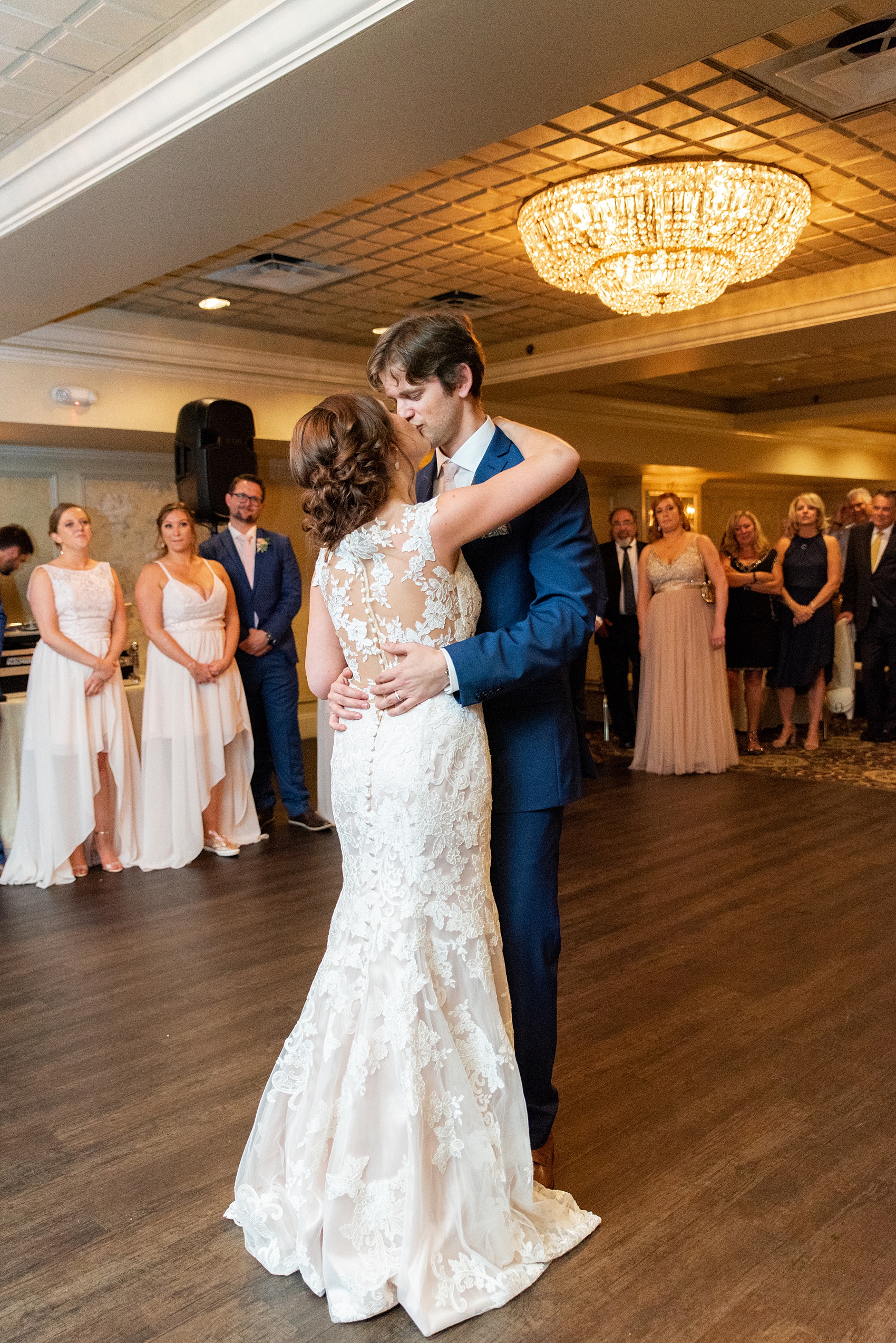 A June wedding at Olde Mill Inn, NJ. Photos by Mikkel Paige Photography for an event with pink details. This New Jersey venue is a great option for something not too far from NYC. The reception was filled with unique glass terrarium vases, colorful pink flowers and greenery, peonies and Midsummer Night’s Dream theme details. The bride and groom shared their first dance for their indoor party to kick off the reception. Click through for their complete wedding recap! #OldeMillInn #NJwedding #NJweddingphotographer #mikkelpaige #NewJerseyWeddingVenue #NewJerseyWedding #firstdance #MidsummerNightsDream