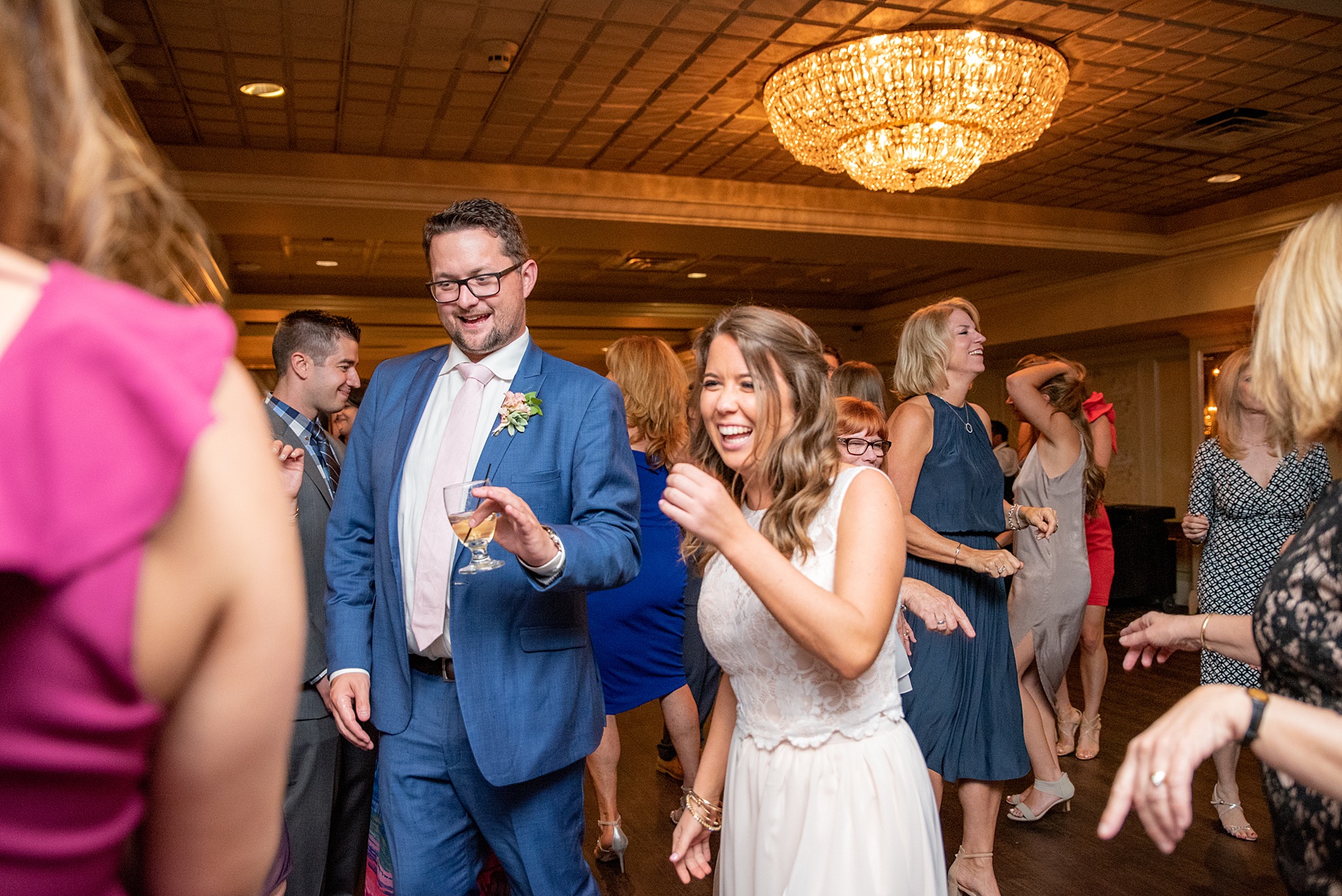 A June wedding at Olde Mill Inn, NJ. Photos by Mikkel Paige Photography for an event with pink details. This New Jersey venue is a great option for something not too far from NYC. The reception was filled with unique glass terrarium vases, colorful pink flowers and greenery, peonies and Midsummer Night’s Dream theme details. Click through for their complete wedding recap! #OldeMillInn #NJwedding #NJweddingphotographer #mikkelpaige #NewJerseyWeddingVenue #NewJerseyWedding #CrossEstateGardens #weddingdetails #MidsummerNightsDream