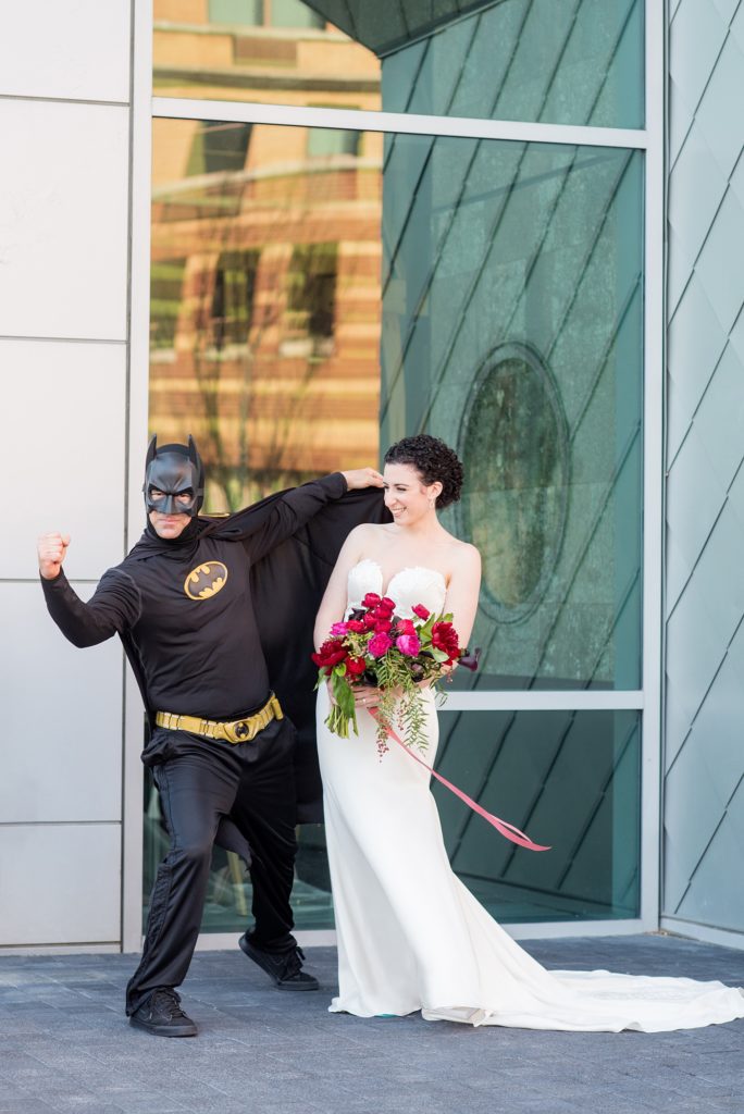 W Hoboken wedding photos in New Jersey by Mikkel Paige Photography. Black tuxedos and dresses were accented by colorful flowers and the NYC skyline for an April wedding.