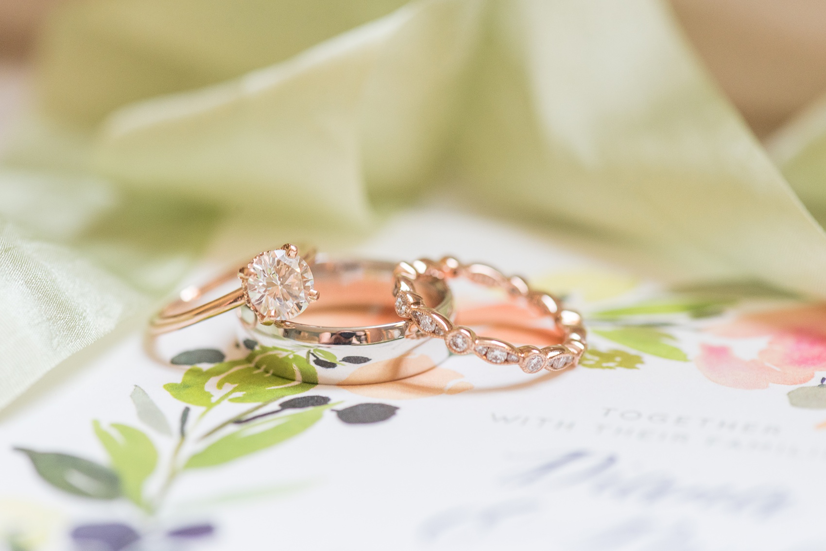 Wedding photos at Crabtree's Kittle House in Chappaqua, New York by Mikkel Paige Photography. The bride and groom's rings were photographed in this venue in Westchester county for a summer wedding. Their rings were white and rose gold and had diamond detail on the side. Click through to see what was engraved in the groom's ring! #groomdetails #mikkelpaige #CrabtreesKittleHouse #WestchesterWeddingVenues #WestchesterWedding #summerwedding #weddingdetails #rosegold #weddingrings #engagementringsidedetail 