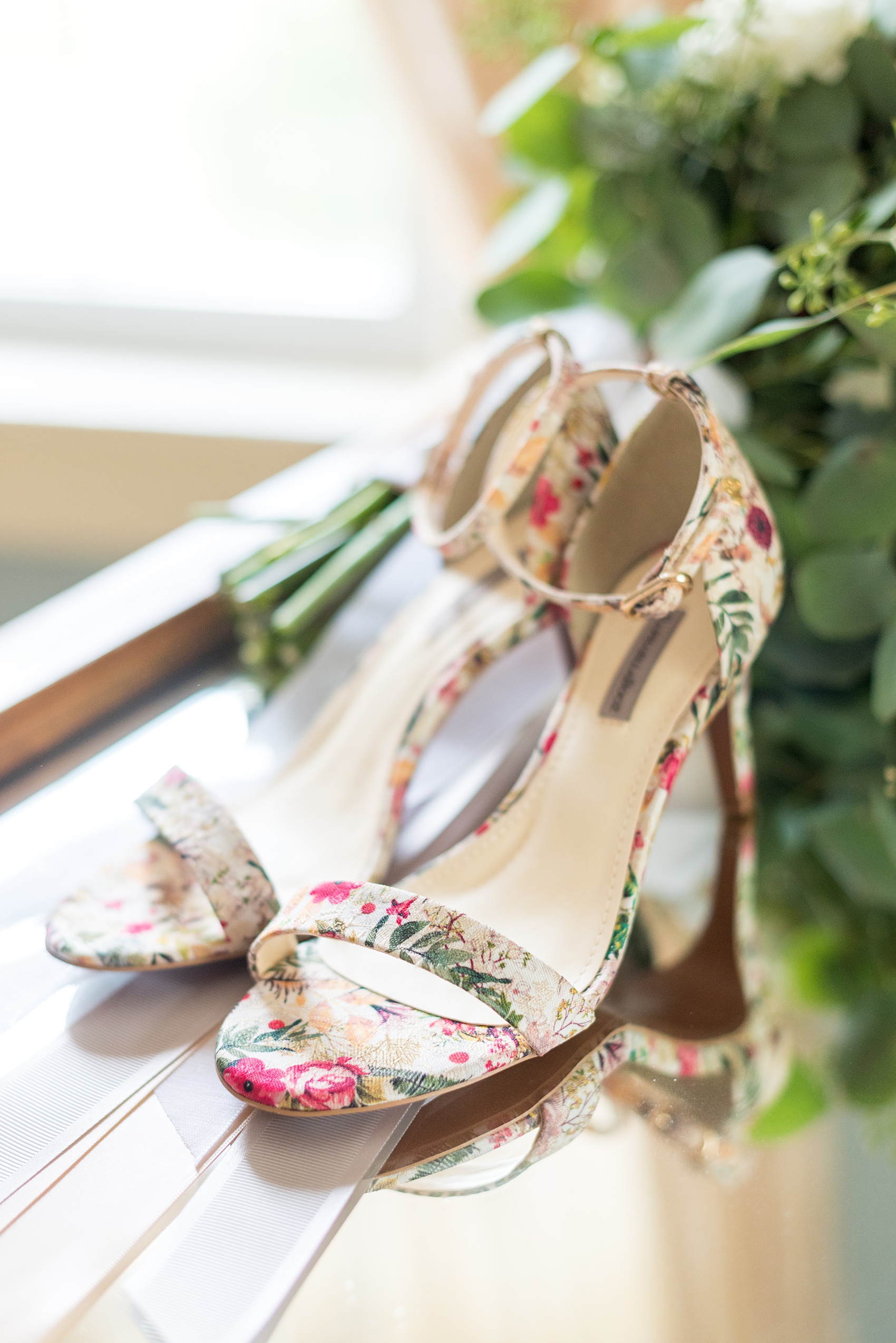 Wedding photos at Crabtree's Kittle House in Chappaqua, New York by Mikkel Paige Photography. The bride wore fun flower pattern shoes for her wedding day at this historic Westchester County venue very close to NYC. Click through to see more detail photos from this gorgeous day! #mikkelpaige #CrabtreesKittleHouse #WestchesterWeddingVenues #WestchesterWedding #summerwedding #weddingdetails #bride #weddingdetails #weddingshoes #floralbrideshoes #floralweddingdetails #patternweddingshoes #historichome 