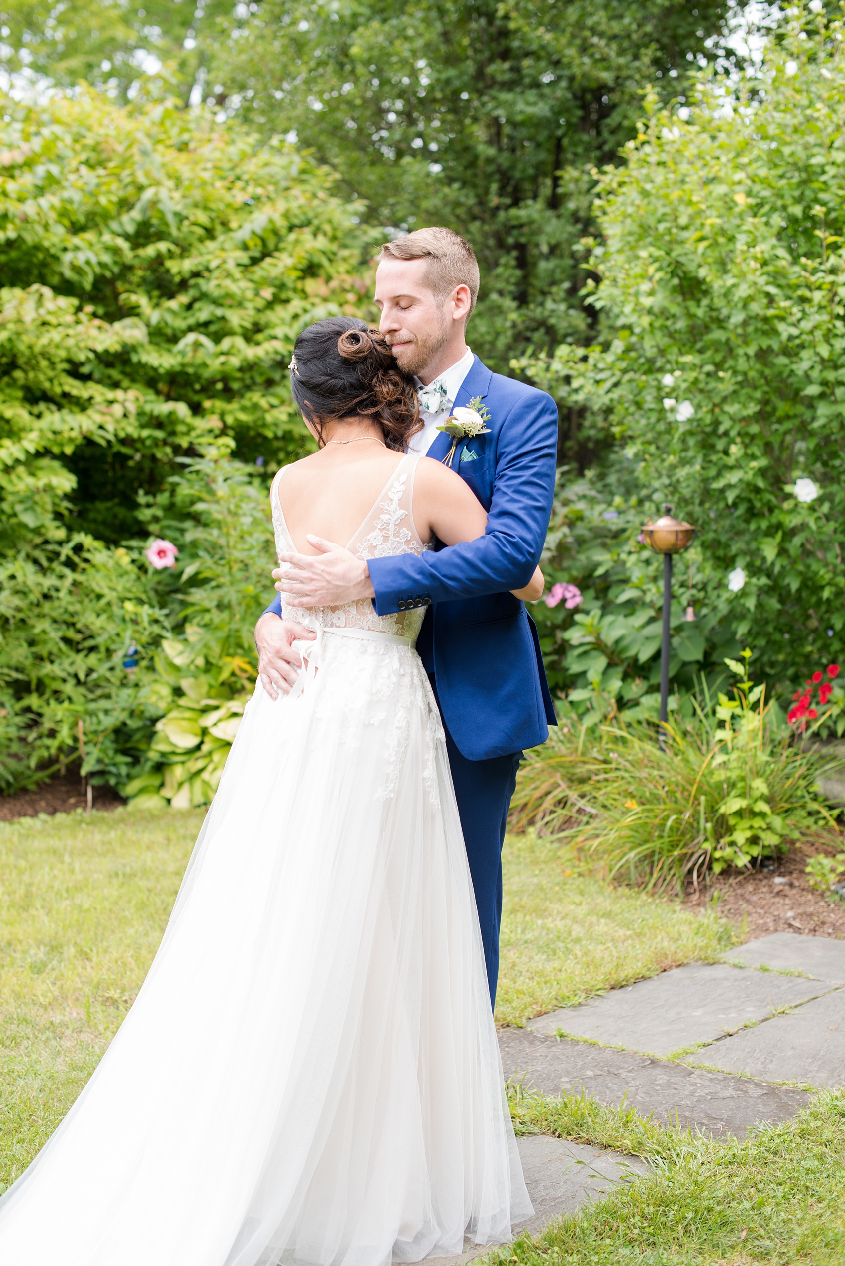 Wedding photos at Crabtree's Kittle House in Chappaqua, New York by Mikkel Paige Photography. This venue in Westchester county had the perfect garden for the bride and groom's first look. #firstlook #mikkelpaige #CrabtreesKittleHouse #WestchesterWeddingVenues #WestchesterWedding #summerwedding 