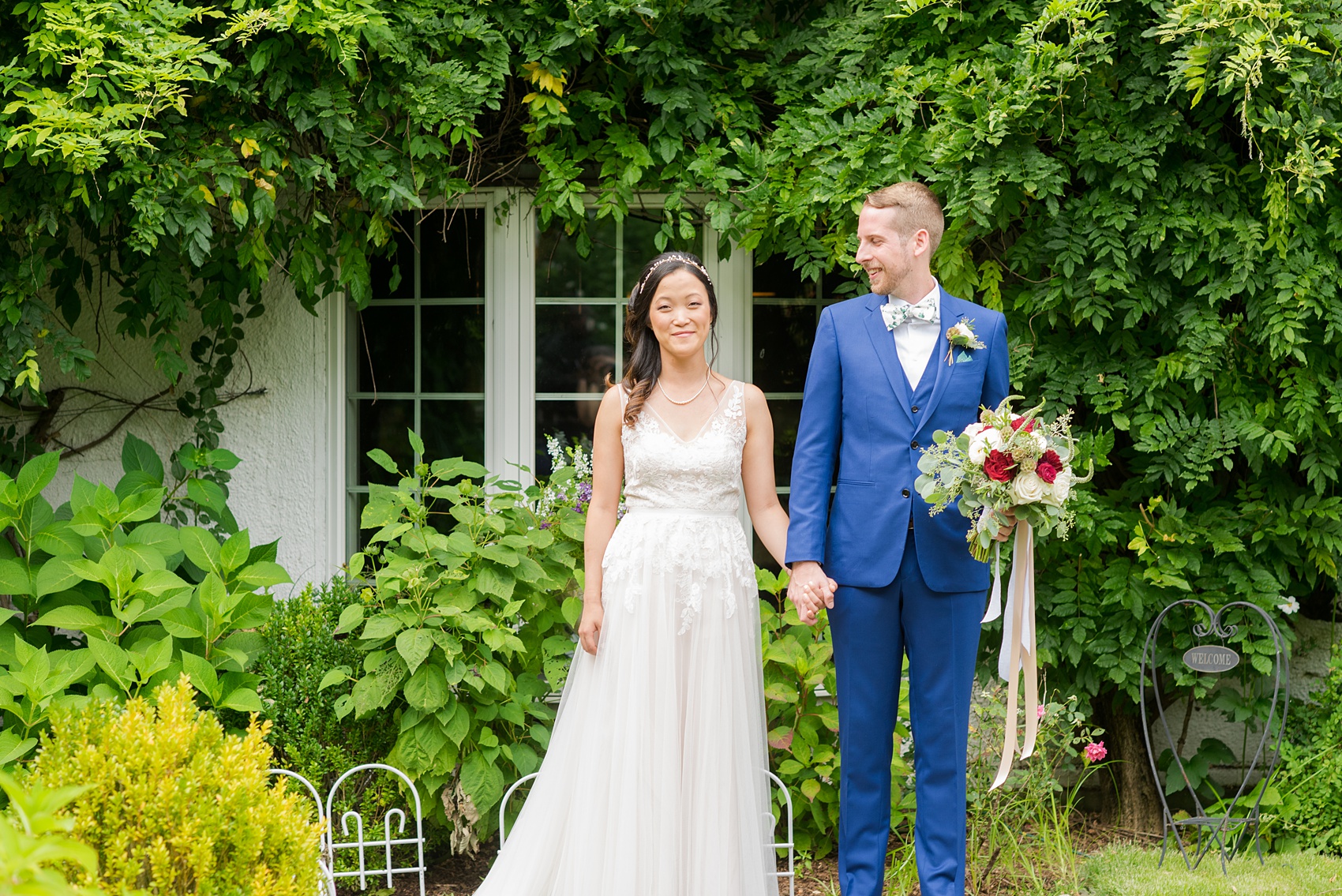 Wedding photos at Crabtree's Kittle House in Chappaqua, New York by Mikkel Paige Photography. This venue in Westchester county has the perfect elegance of a rustic elegant home and garden feel very close to NYC. The bride wore a gown from BHLDN and groom a custom blue Indochino suit. #bluesuit #BHLDNgown #mikkelpaige #CrabtreesKittleHouse #WestchesterWeddingVenues #WestchesterWedding #AsianBride #summerwedding 