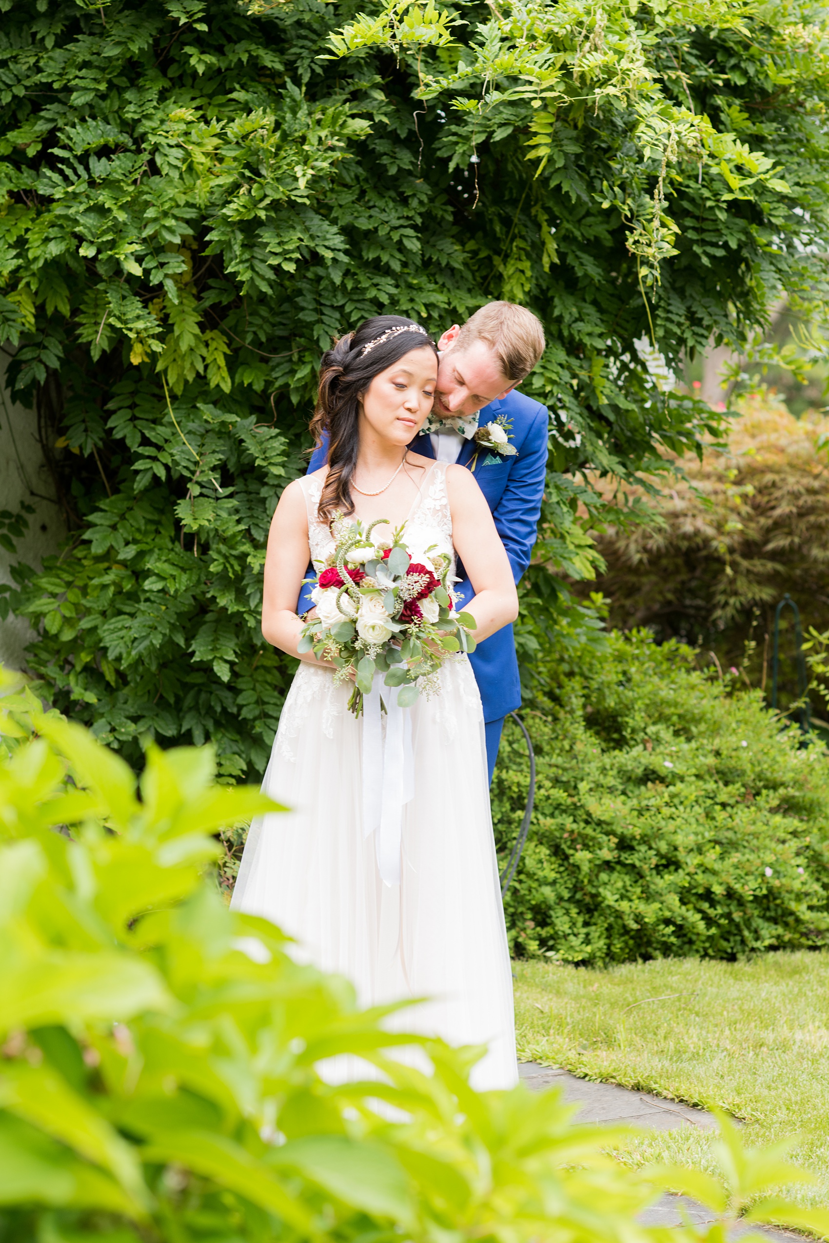 Wedding photos at Crabtree's Kittle House in Chappaqua, New York by Mikkel Paige Photography. This venue in Westchester county has the perfect elegance of a rustic home and garden very close to NYC. The bride wore a gown from BHLDN and groom a custom blue Indochino suit. #bluesuit #BHLDNgown #mikkelpaige #CrabtreesKittleHouse #WestchesterWeddingVenues #WestchesterWedding #summerwedding 