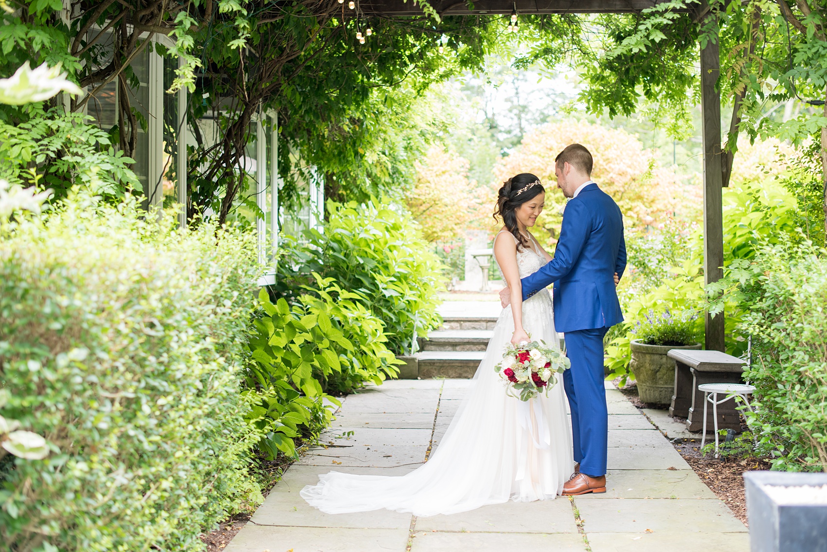 Wedding photos at Crabtree's Kittle House in Chappaqua, New York by Mikkel Paige Photography. This venue in Westchester county has the perfect elegance of a rustic home and garden very close to NYC. The bride wore a gown from BHLDN and groom a custom blue Indochino suit. #bluesuit #BHLDNgown #mikkelpaige #CrabtreesKittleHouse #WestchesterWeddingVenues #WestchesterWedding #summerwedding 
