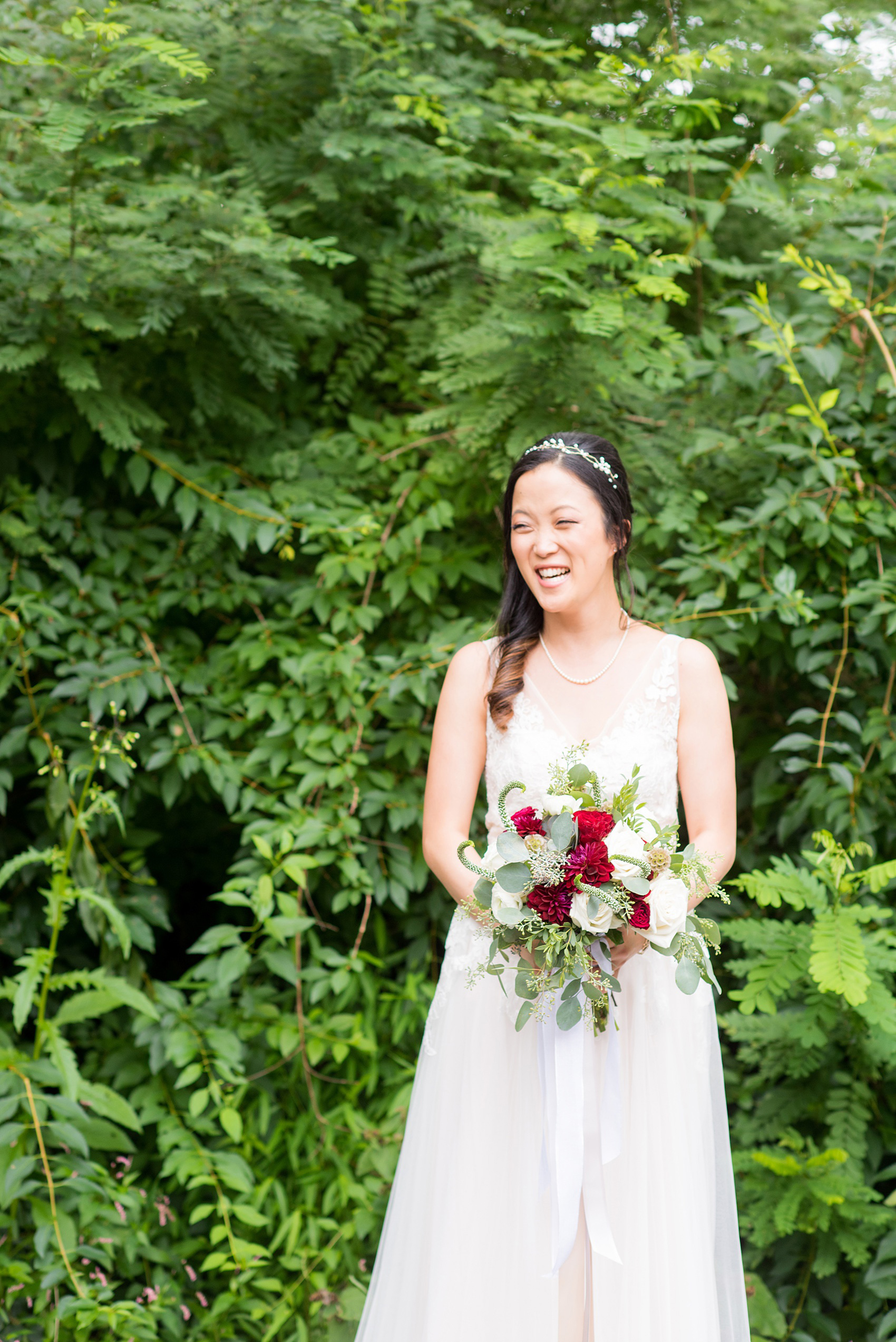 Wedding photos at Crabtree's Kittle House in Chappaqua, New York by Mikkel Paige Photography. The bride wore a summery lace and tulle gown from BHLDN for her wedding and held a bouquet with red and white flowers at this historic Westchester County venue very close to NYC. Click through to see more detail photos from this gorgeous day! #mikkelpaige #CrabtreesKittleHouse #WestchesterWeddingVenues #WestchesterWedding #summerwedding #weddingdetails #bride #weddingdetails #BHLDN #laceandtullegown #summerweddingdress #redandwhitebouquet