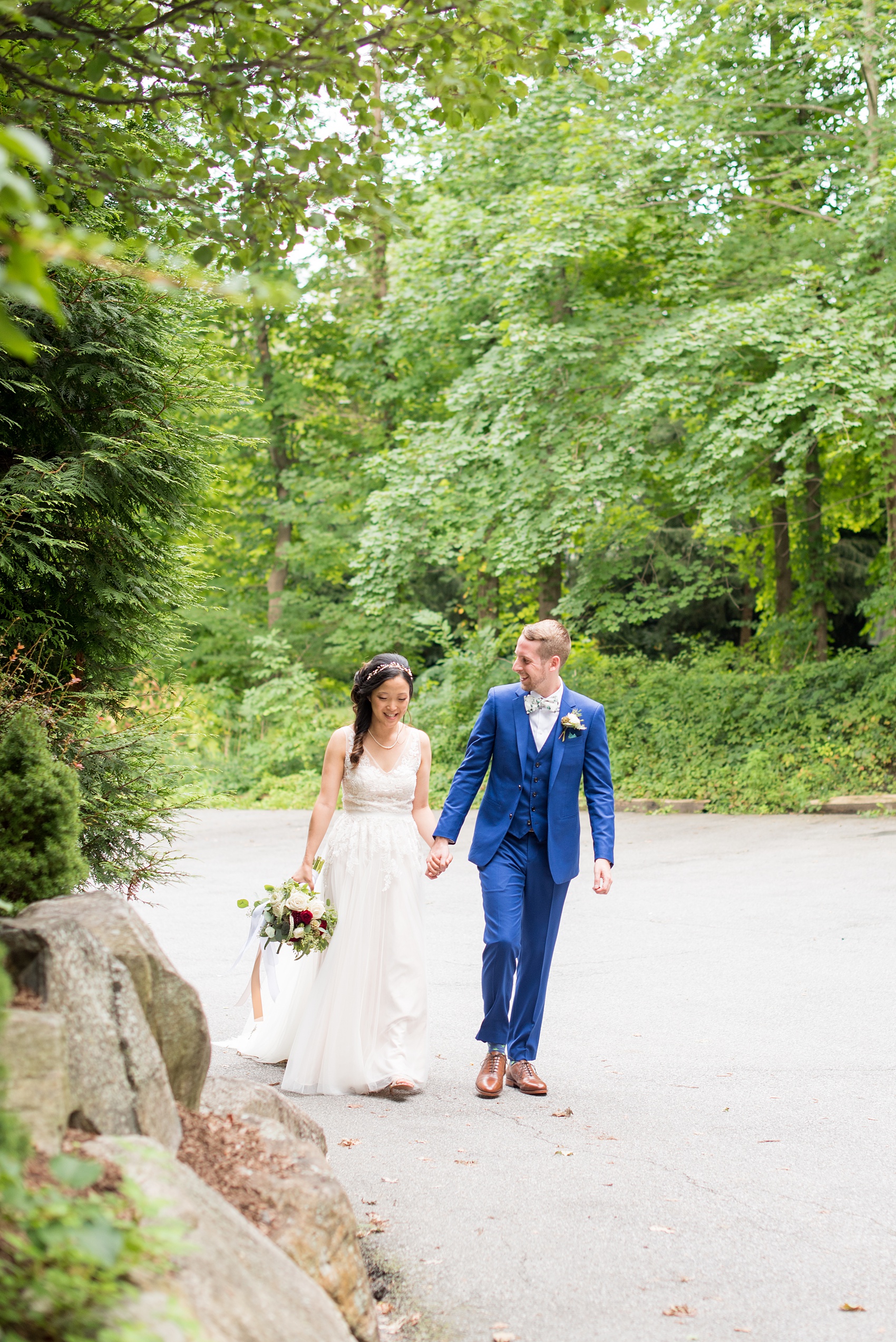 Wedding photos at Crabtree's Kittle House in Chappaqua, New York by Mikkel Paige Photography. This venue in Westchester county has the perfect elegance of a rustic home and garden feel very close to NYC. The bride wore a gown from BHLDN and groom a custom blue Indochino suit. Click through for more summer wedding inspiration from their day! #bluesuit #BHLDNgown #mikkelpaige #CrabtreesKittleHouse #WestchesterWeddingVenues #WestchesterWedding #AsianBride #summerwedding #brideandgroom