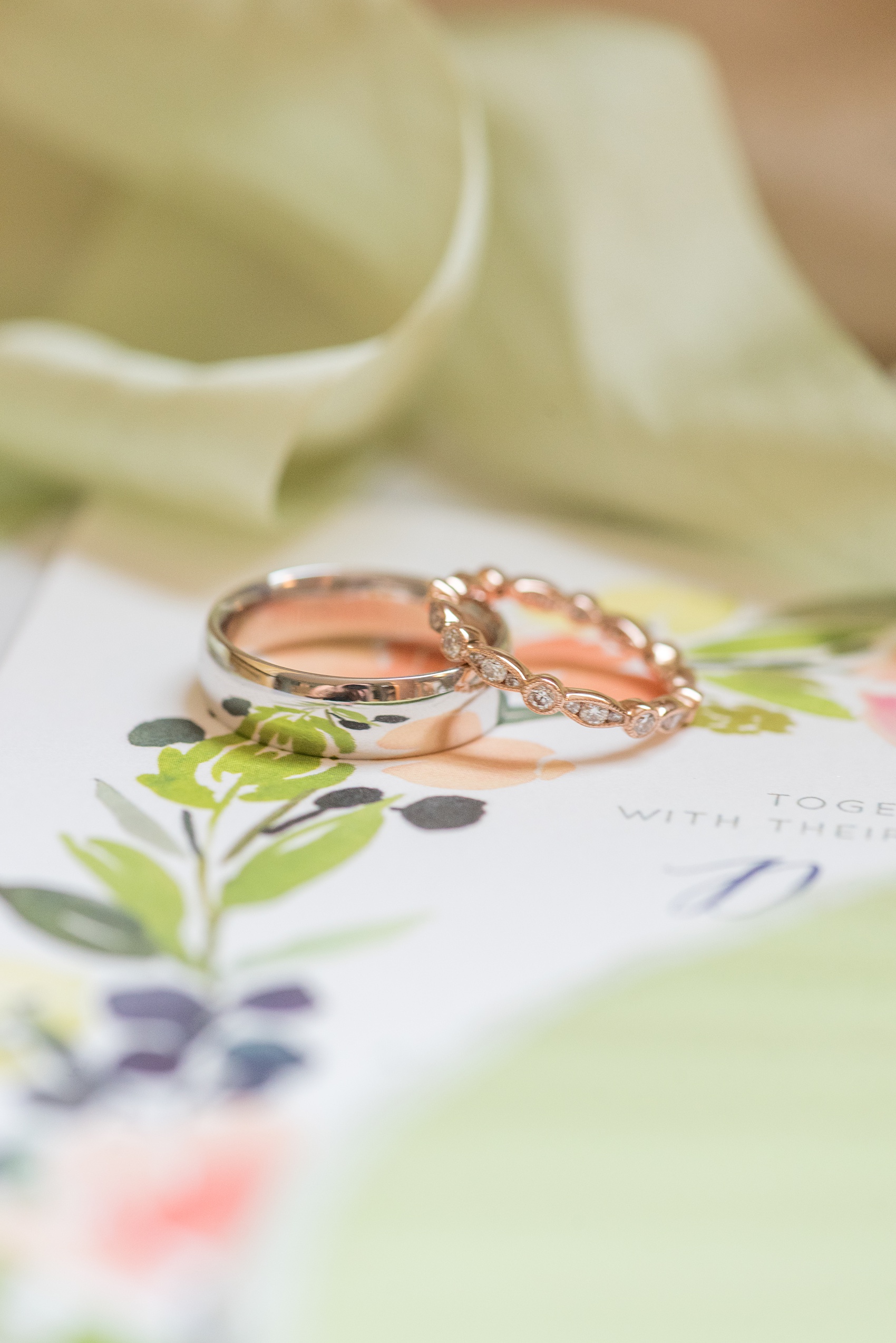 Wedding photos at Crabtree's Kittle House in Chappaqua, New York by Mikkel Paige Photography. The bride and groom's rings were photographed in this venue in Westchester county for a summer wedding. Their rings were white and rose gold and had diamond detail on the side. Click through to see what was engraved in the groom's ring! #groomdetails #mikkelpaige #CrabtreesKittleHouse #WestchesterWeddingVenues #WestchesterWedding #summerwedding #weddingdetails #rosegold #weddingrings #engagementringsidedetail