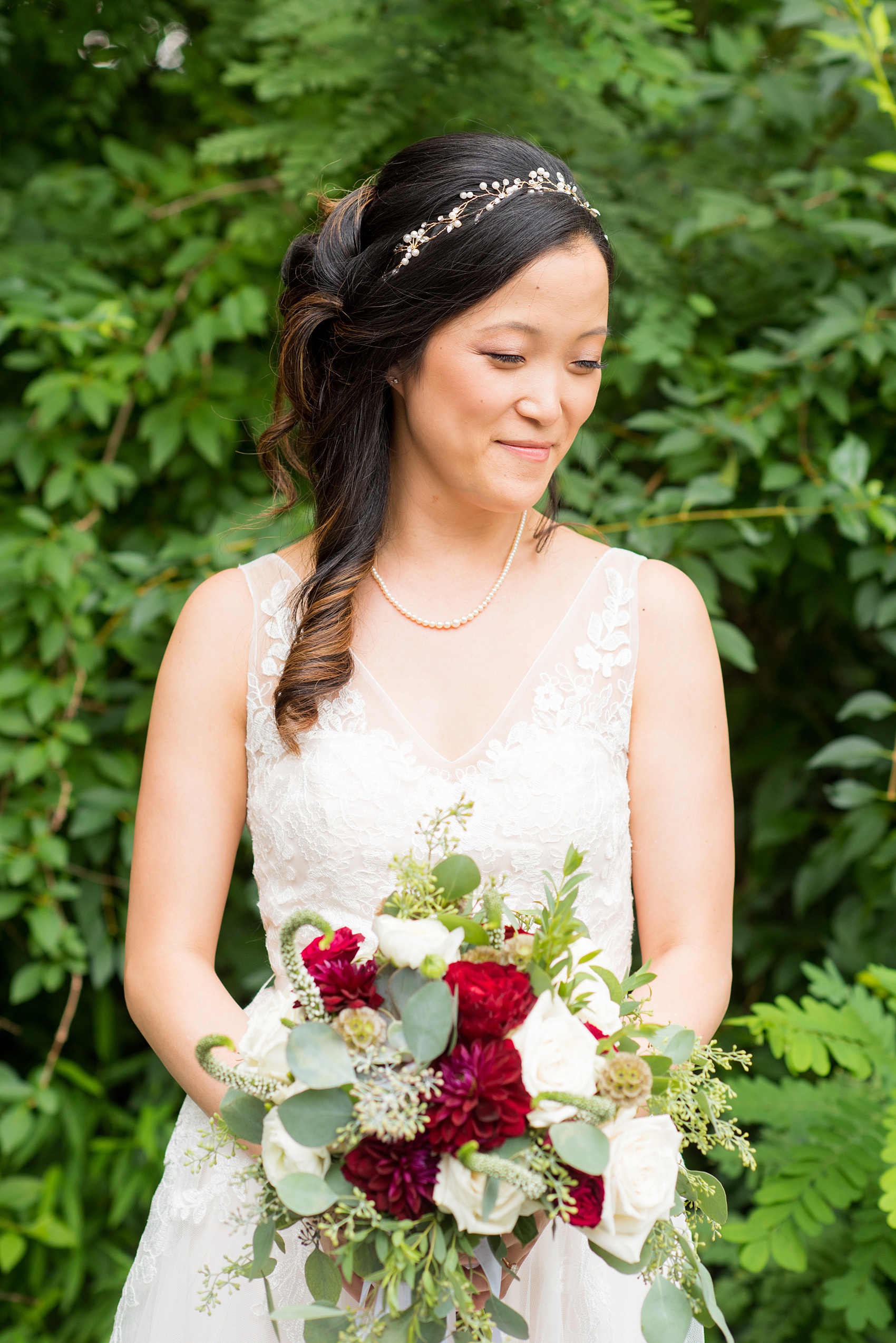 Wedding photos at Crabtree's Kittle House in Chappaqua, New York by Mikkel Paige Photography. The bride wore a summery lace and tulle gown from BHLDN for her wedding and held a bouquet with red and white flowers at this historic Westchester County venue very close to NYC. Click through to see more detail photos from this gorgeous day! #mikkelpaige #CrabtreesKittleHouse #WestchesterWeddingVenues #WestchesterWedding #summerwedding #weddingdetails #bride #weddingdetails #BHLDN #laceandtullegown #summerweddingdress #redandwhitebouquet #weddinghairstyles