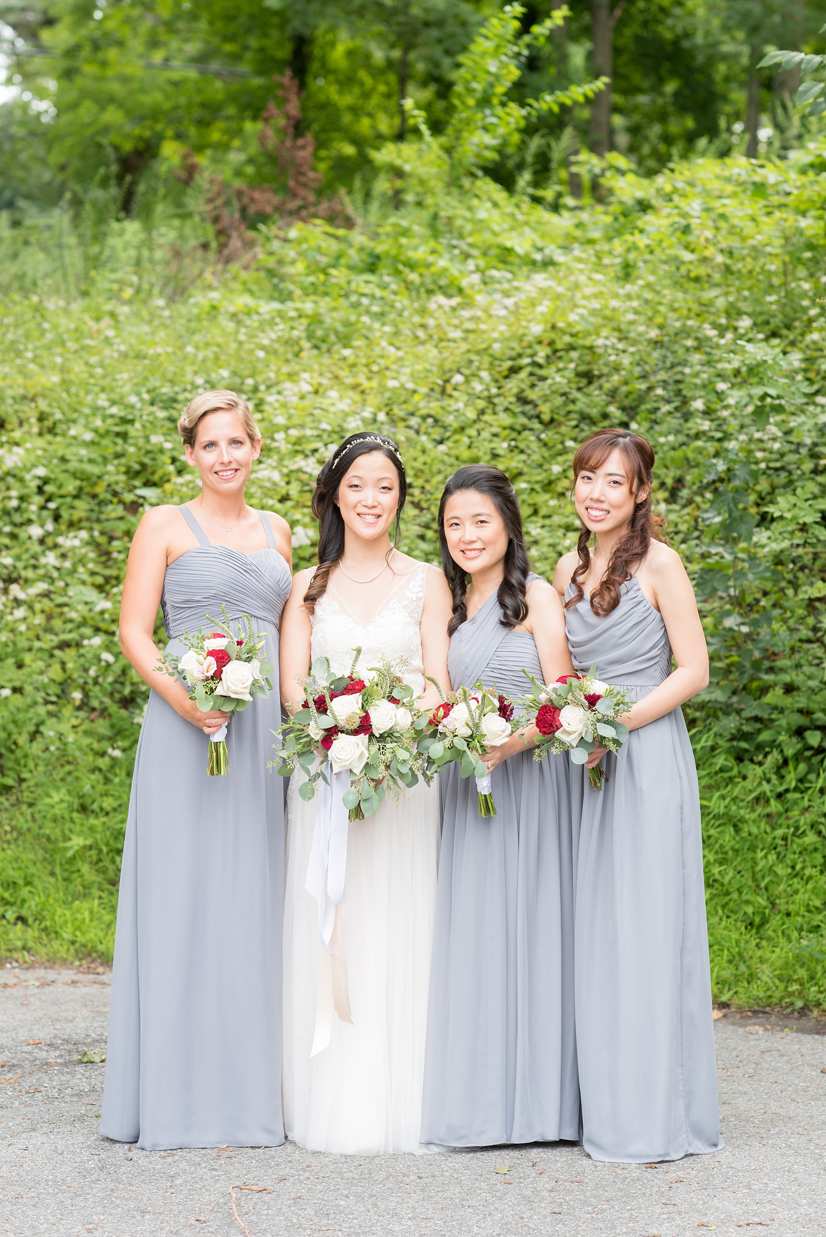 Wedding photos at Crabtree's Kittle House in Chappaqua, New York by Mikkel Paige Photography. This venue in Westchester county was a beautiful location to capture summer bridal party pictures, with the bridesmaids in grey gowns. The historic home is very close to NYC. Click through for more wedding inspiration from their day! #mikkelpaige #CrabtreesKittleHouse #WestchesterWeddingVenues #WestchesterWedding #AsianBride #summerwedding #brideandgroom #weddingparty #bridalparty #greybridesmaidsdresses #greybridesmaidsgowns 