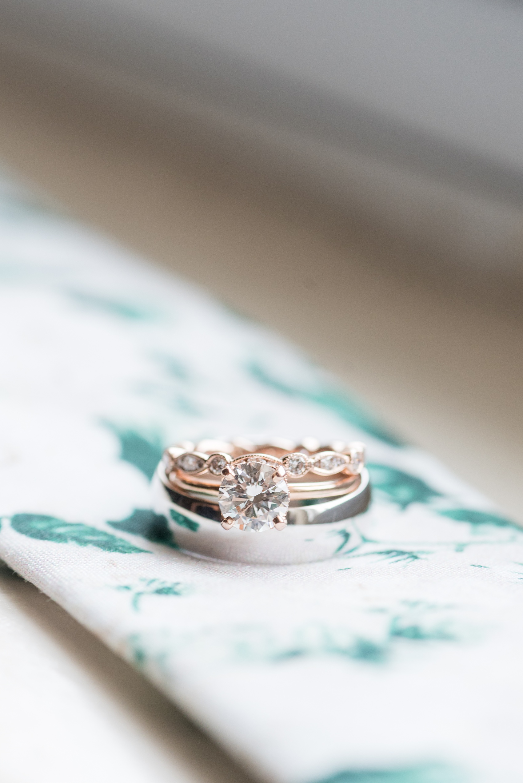 Wedding photos at Crabtree's Kittle House in Chappaqua, New York by Mikkel Paige Photography. The bride and groom's rings were photographed in this venue in Westchester county for a summer wedding. Their rings were white and rose gold and had diamond detail on the side. Click through to see what was engraved in the groom's ring! #groomdetails #mikkelpaige #CrabtreesKittleHouse #WestchesterWeddingVenues #WestchesterWedding #summerwedding #weddingdetails #rosegold #weddingrings #engagementringsidedetail