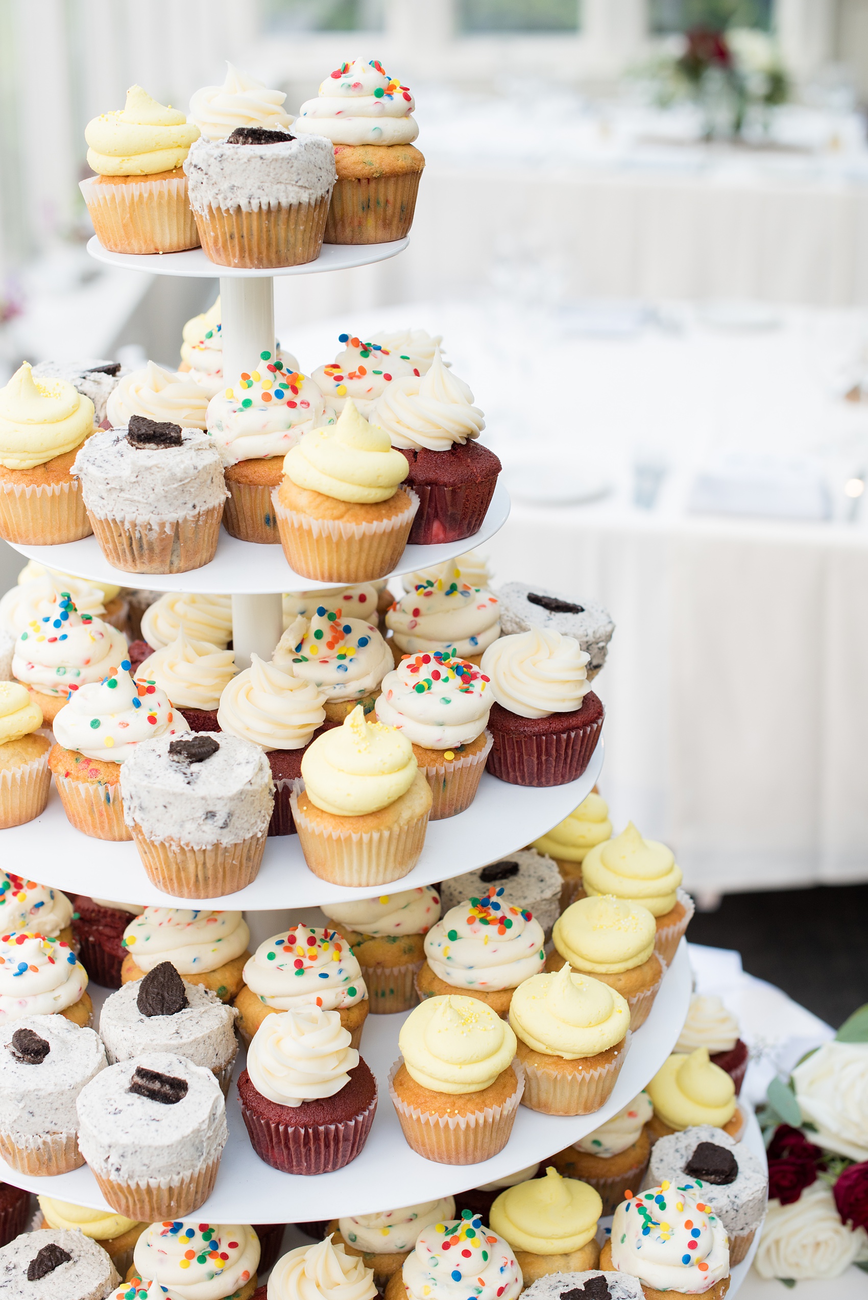 Wedding photos at Crabtree's Kittle House in Chappaqua, New York by Mikkel Paige Photography. The bride and groom decided to have cupcakes instead of wedding cake! Click through for more reception inspiration from this beautiful summer wedding! #mikkelpaige #CrabtreesKittleHouse #WestchesterWeddingVenues #WestchesterWedding #summerwedding #weddingcupcakes #weddingcakesubstitute 