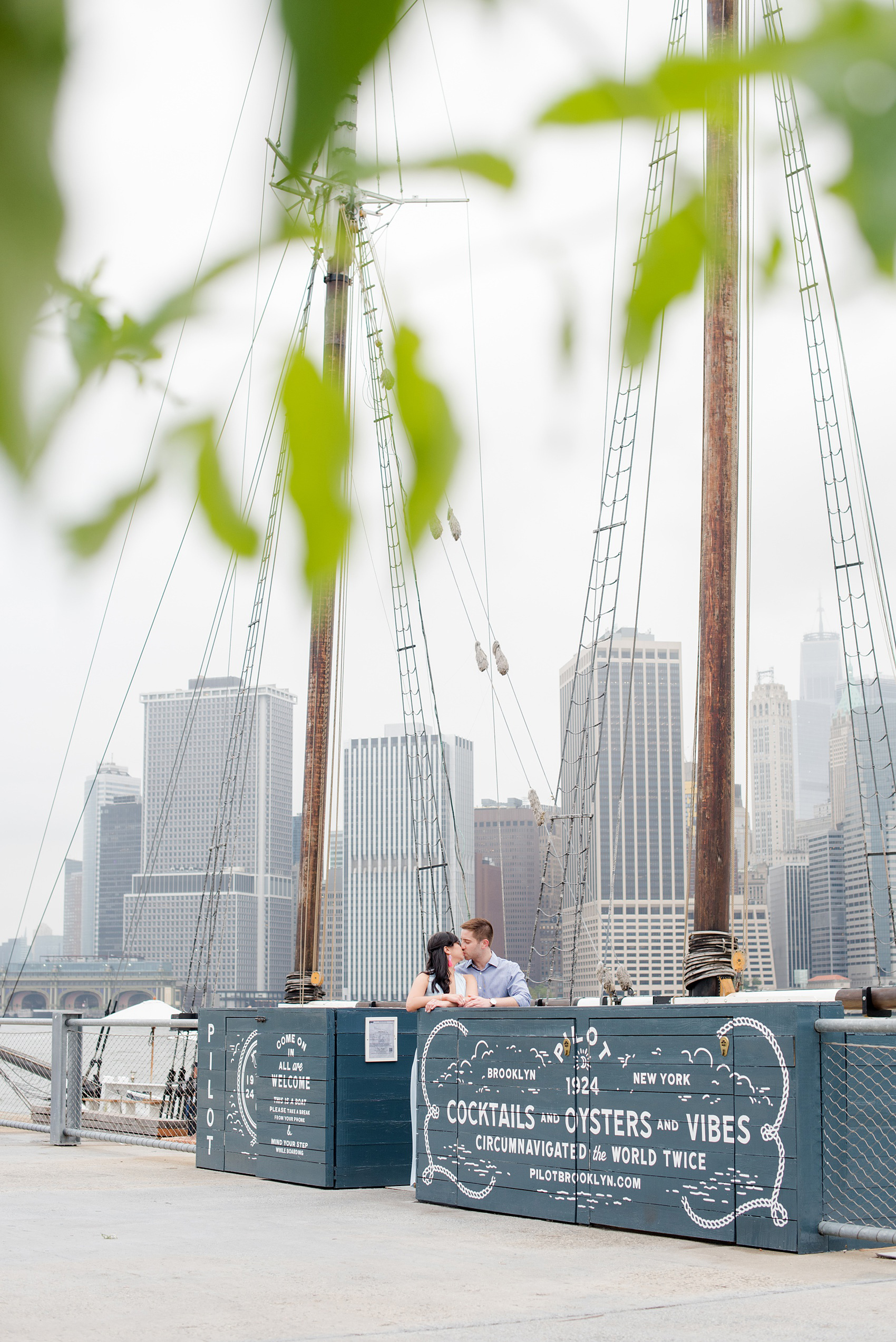 Brooklyn engagement photos by Mikkel Paige Photography. These beautiful, love-filled images in the park overlook bridges, the Manhattan skyline and waterfront on Piers 5 and 6. They'll provide inspiration from the bride and groom for outfits, romantic picture ideas and all around feel-good smiles! Click through to see their complete session post! #mikkelpaige #NYCweddingphotographer #NYCengagementsession #brooklynengagementphotos #engagementphotosinBrooklyn #BrooklynBridgePark #BrooklynPiers #ManhattanSkyline #BrooklynBridge #cityengagementphotos