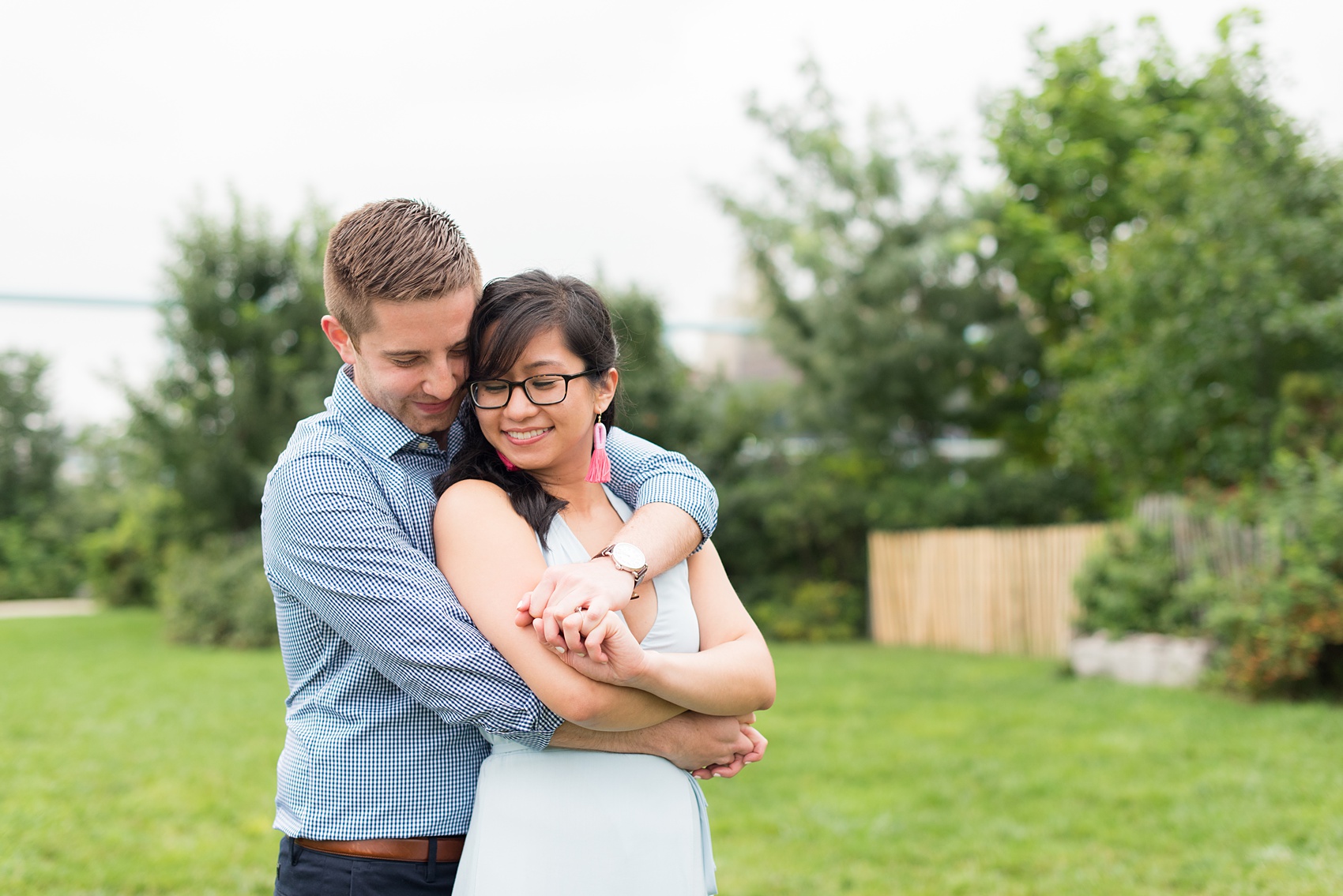 Brooklyn engagement photos by Mikkel Paige Photography. These beautiful, love-filled images in the park overlook bridges, the Manhattan skyline and waterfront on Piers 5 and 6. They'll provide inspiration from the bride and groom for outfits, romantic picture ideas and all around feel-good smiles! Click through to see their complete session post! #mikkelpaige #NYCweddingphotographer #NYCengagementsession #brooklynengagementphotos #engagementphotosinBrooklyn #BrooklynBridgePark #BrooklynPiers #ManhattanSkyline #BrooklynBridge #cityengagementphotos