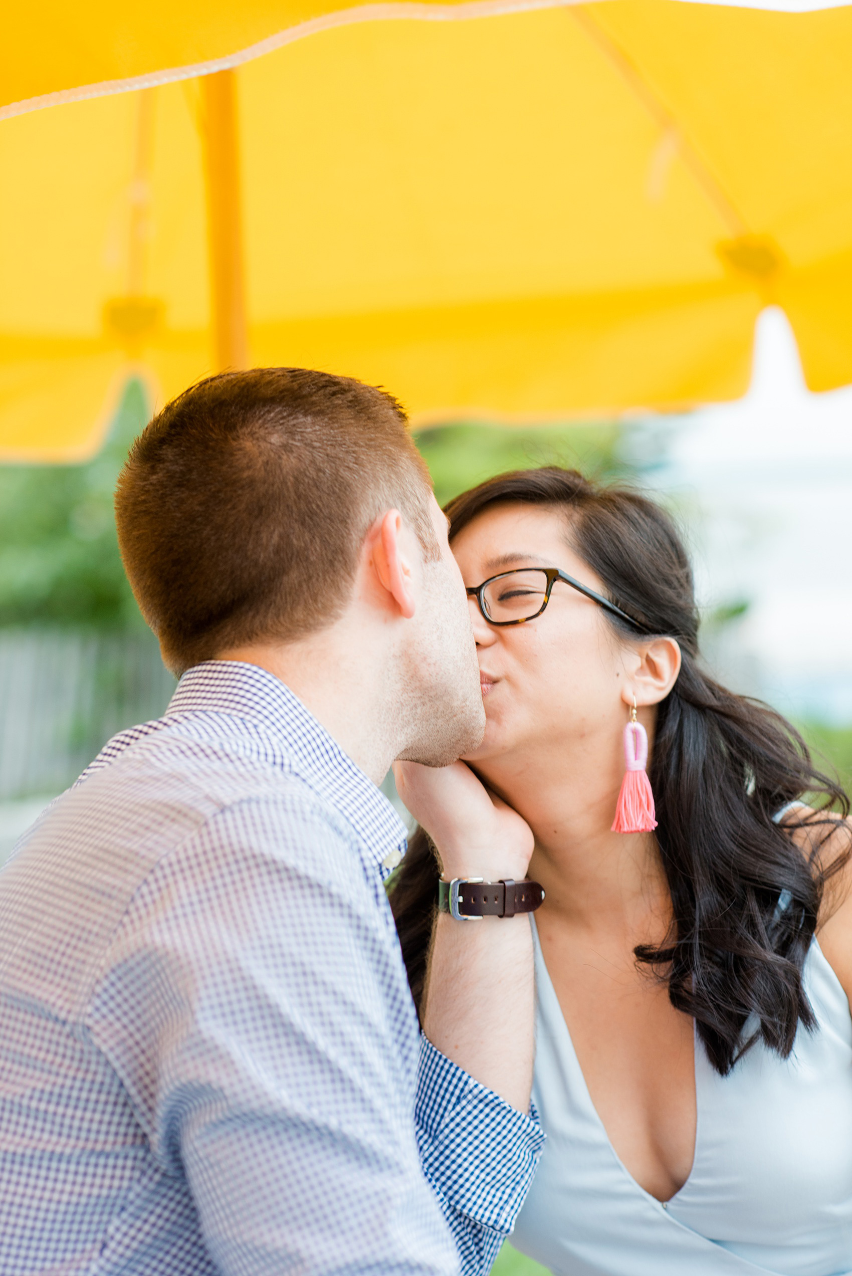 Brooklyn engagement photos by Mikkel Paige Photography. These beautiful, love-filled images in the park overlook bridges, the Manhattan skyline and waterfront on Piers 5 and 6. They'll provide inspiration from the bride and groom for outfits, romantic picture ideas and all around feel-good smiles! Click through to see their complete session post! #mikkelpaige #NYCweddingphotographer #NYCengagementsession #brooklynengagementphotos #engagementphotosinBrooklyn #BrooklynBridgePark #BrooklynPiers #ManhattanSkyline #BrooklynBridge #cityengagementphotos